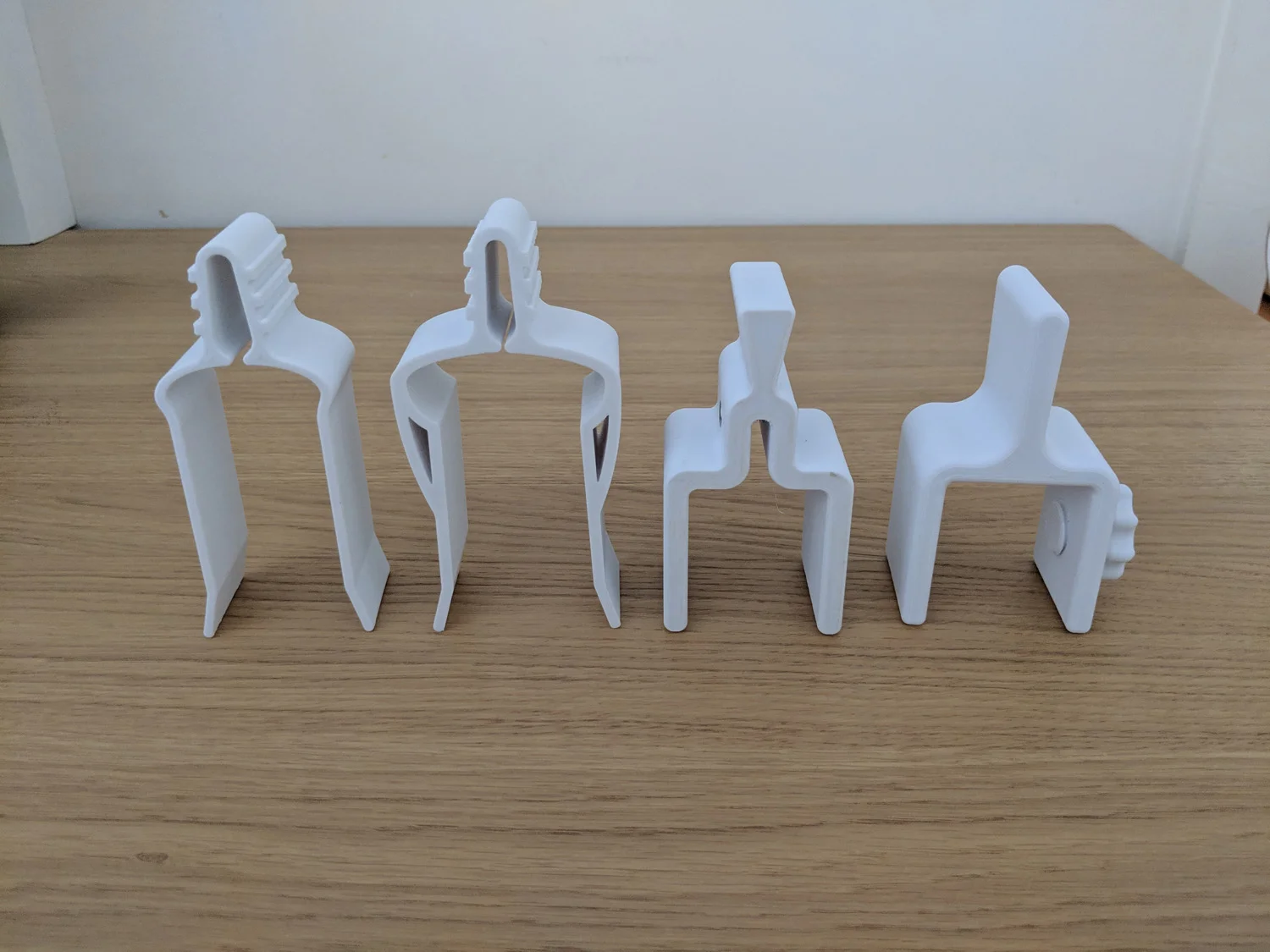 The four printed iterations in order from left to right