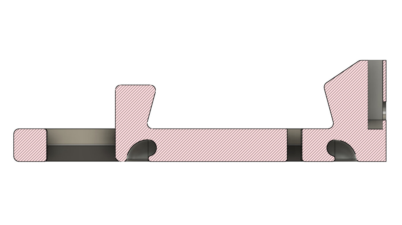 Longitudinal section view showing the elastic band attachment point.