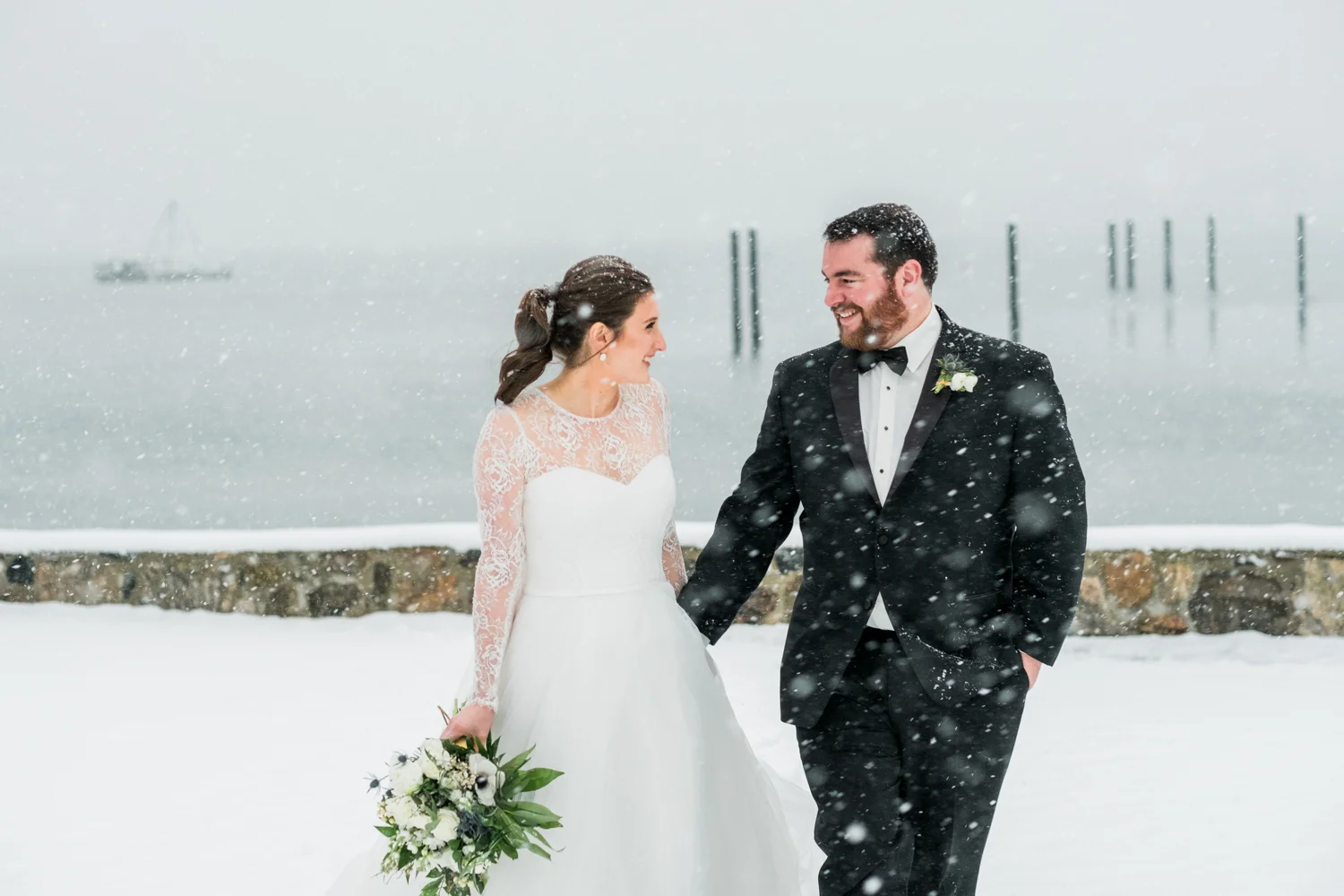 Honorable Mention 1 | Casey & Matt | Stamford Yacht Club Fuji XT2 | 56 f1.2 Casey, Matt, and their wedding party stood out in a blizzard with me for half an hour to get photos like this one. When you plan a December wedding in New England you can end up with days like these. Crazy, beautiful, perfect days.