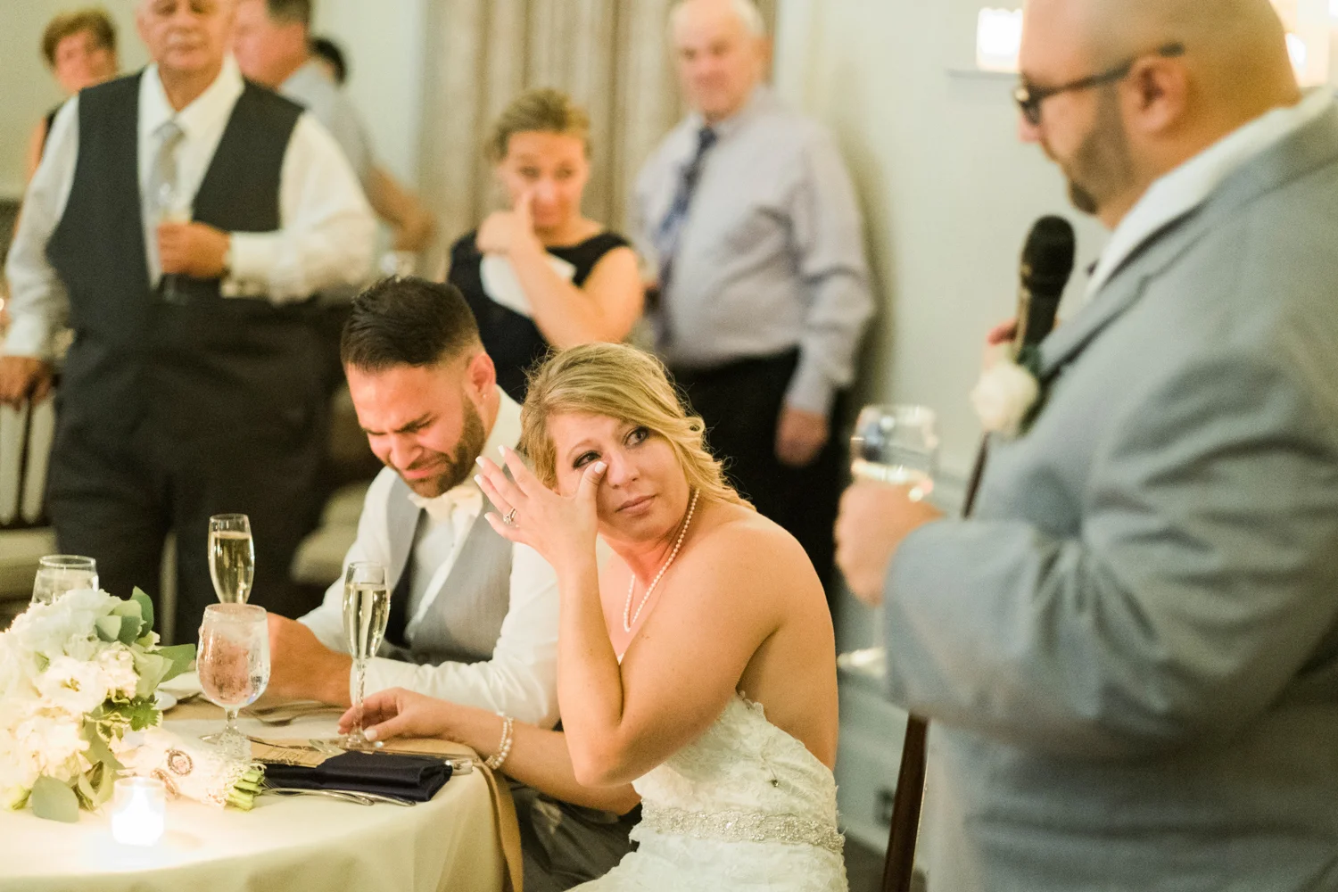 Top of 17 | Number 6 | Kaelyn & Anthony | The New Haven Lawn Club Fuji XT2 | Fuji 56 f1.2 Corey and I have both always said you can judge the strength of a couple's love through the people they surround themselves with. This moment, during the best man's speech, defines that strength perfectly. When you marry someone, and the joy you feel with that person brings just as much joy to the people around you - that's how you know it's for real. This is a simple, but powerful image, and an easy pick for 2017.