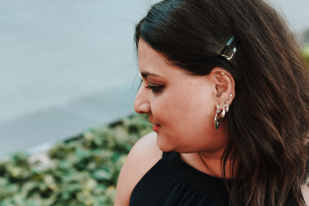 Have multiple piercings? Stack our small silver hoops and medium silver hoops together to pair delicate and bold and create an earring stack. #earringstack