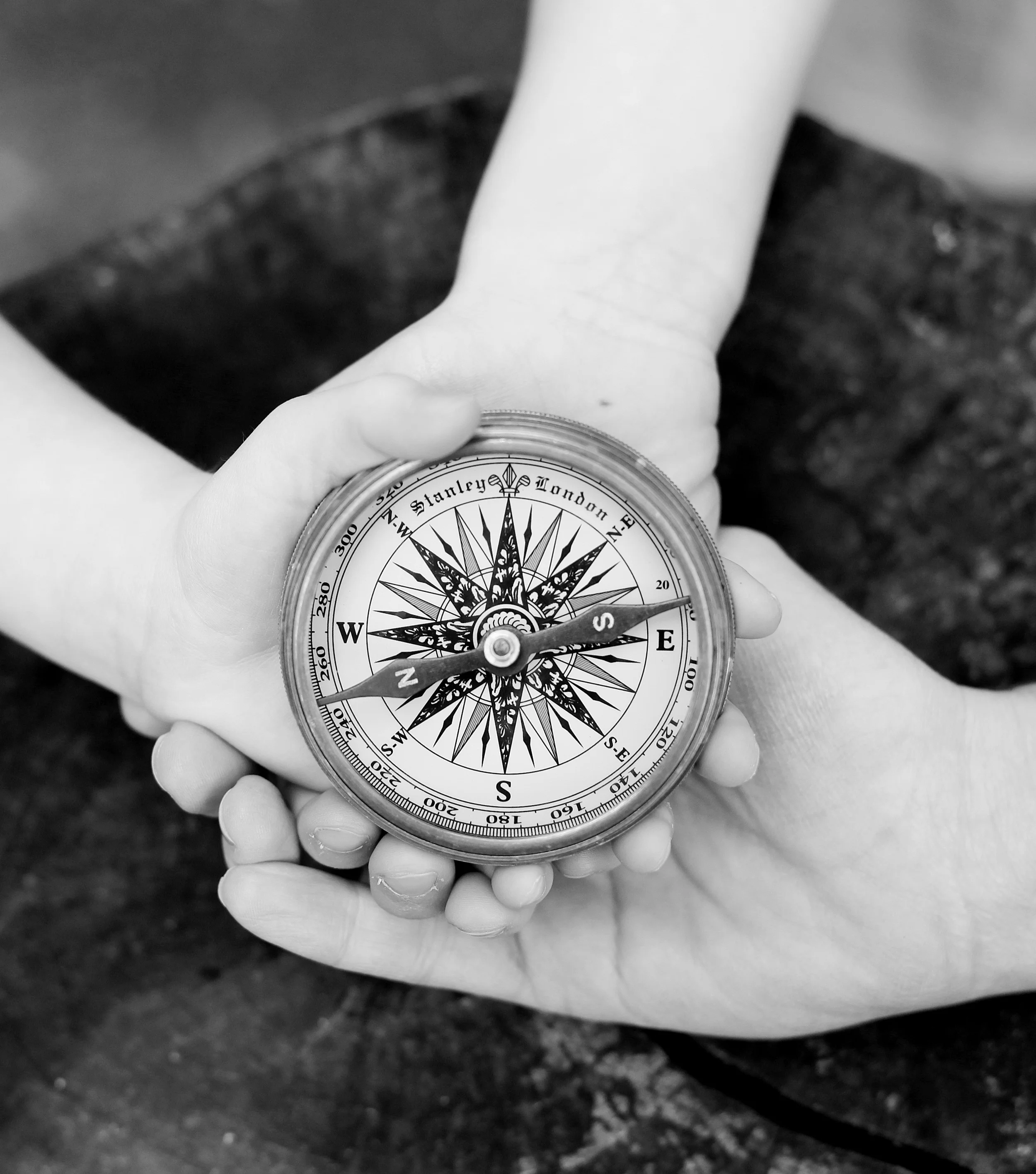 Hands on compass.jpg