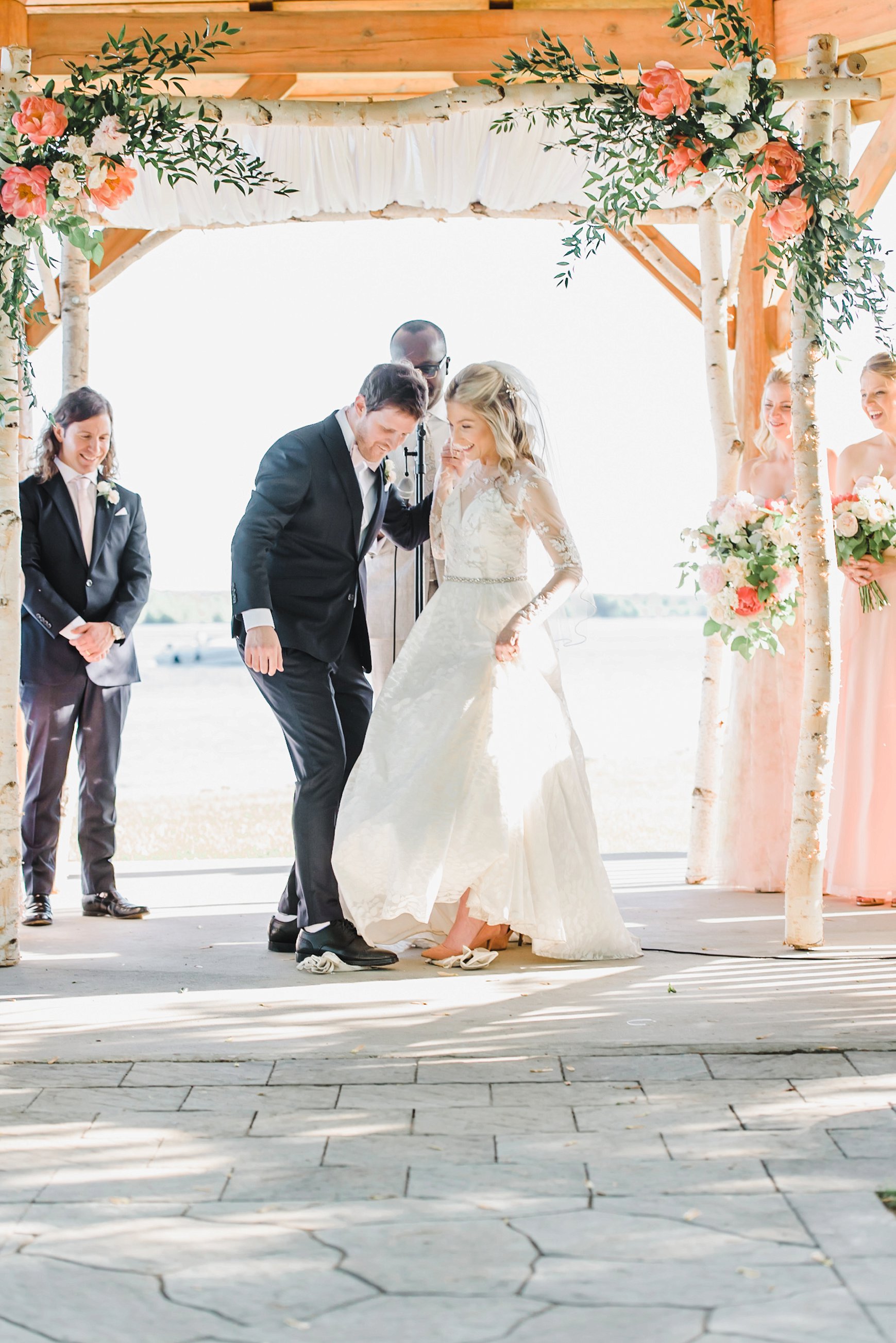  In the Jewish tradition, the groom typically breaks the glass after he has placed the ring on the bride’s finger.  In Emily and Jonah’s case, they decided to break the glass together! 