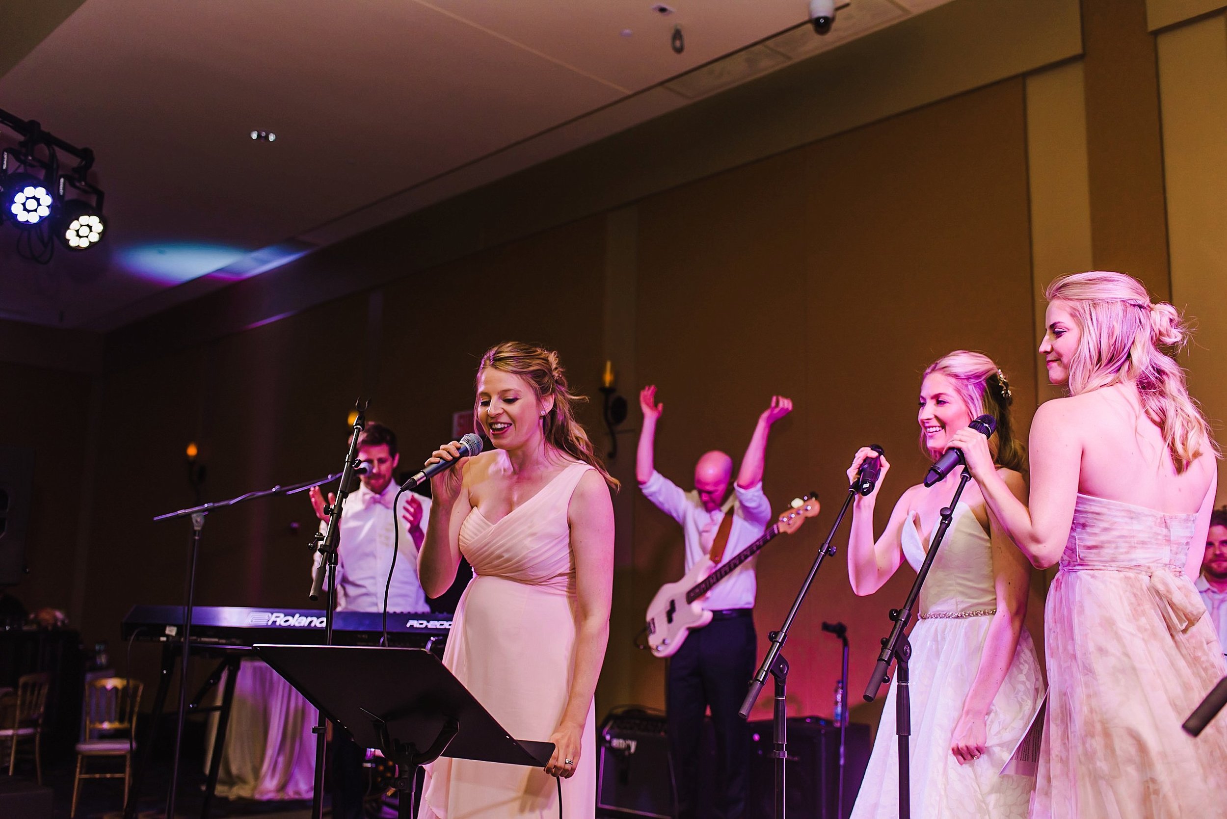  The bride got on stage with her sisters, who are equally as talented! 