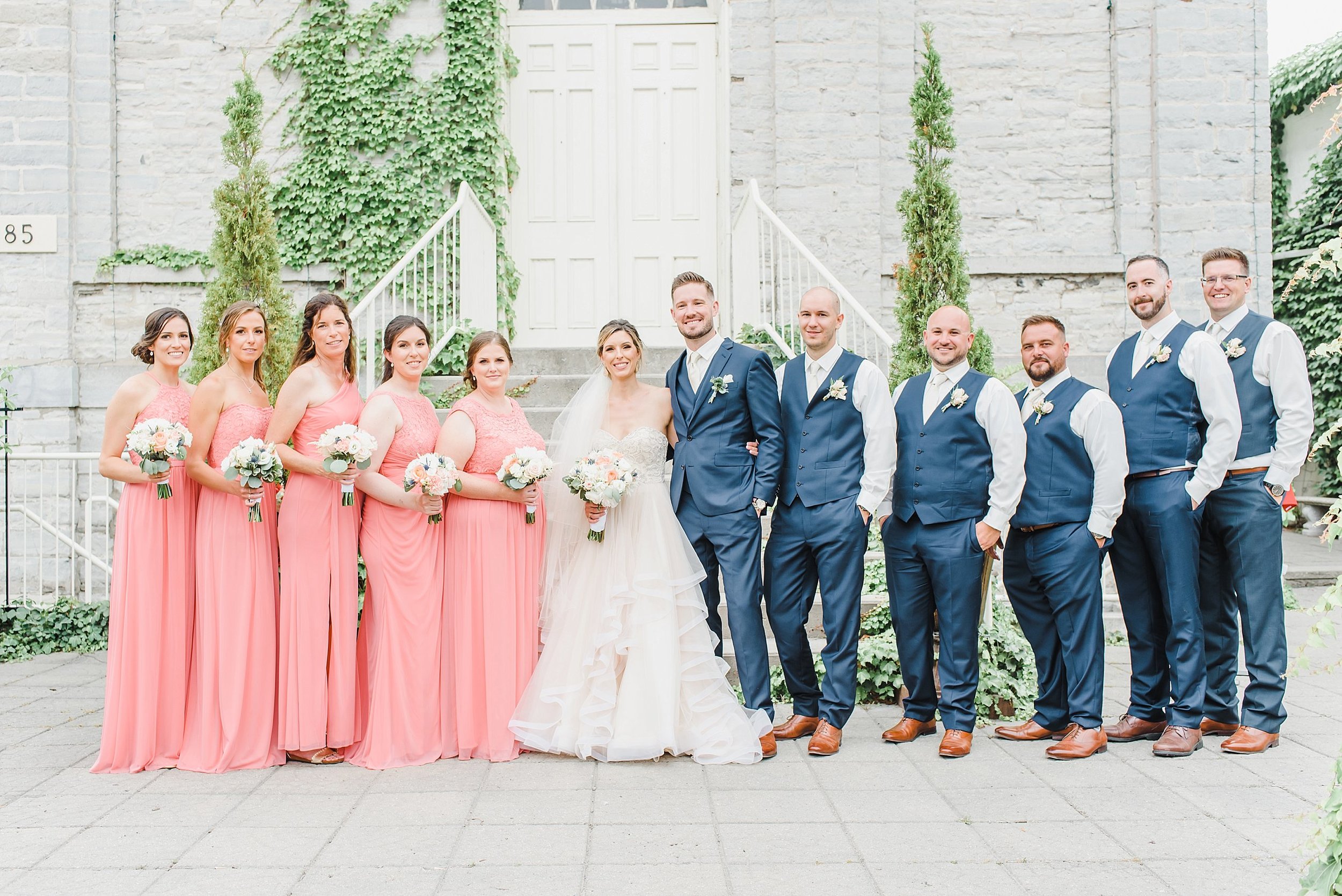  The rain started pouring a few minutes after the ceremony took place, so we took cover and went on over to the reception space, the Renaissance Events Venue, where the rain decided to hold off a little longer for bridal party portraits! 