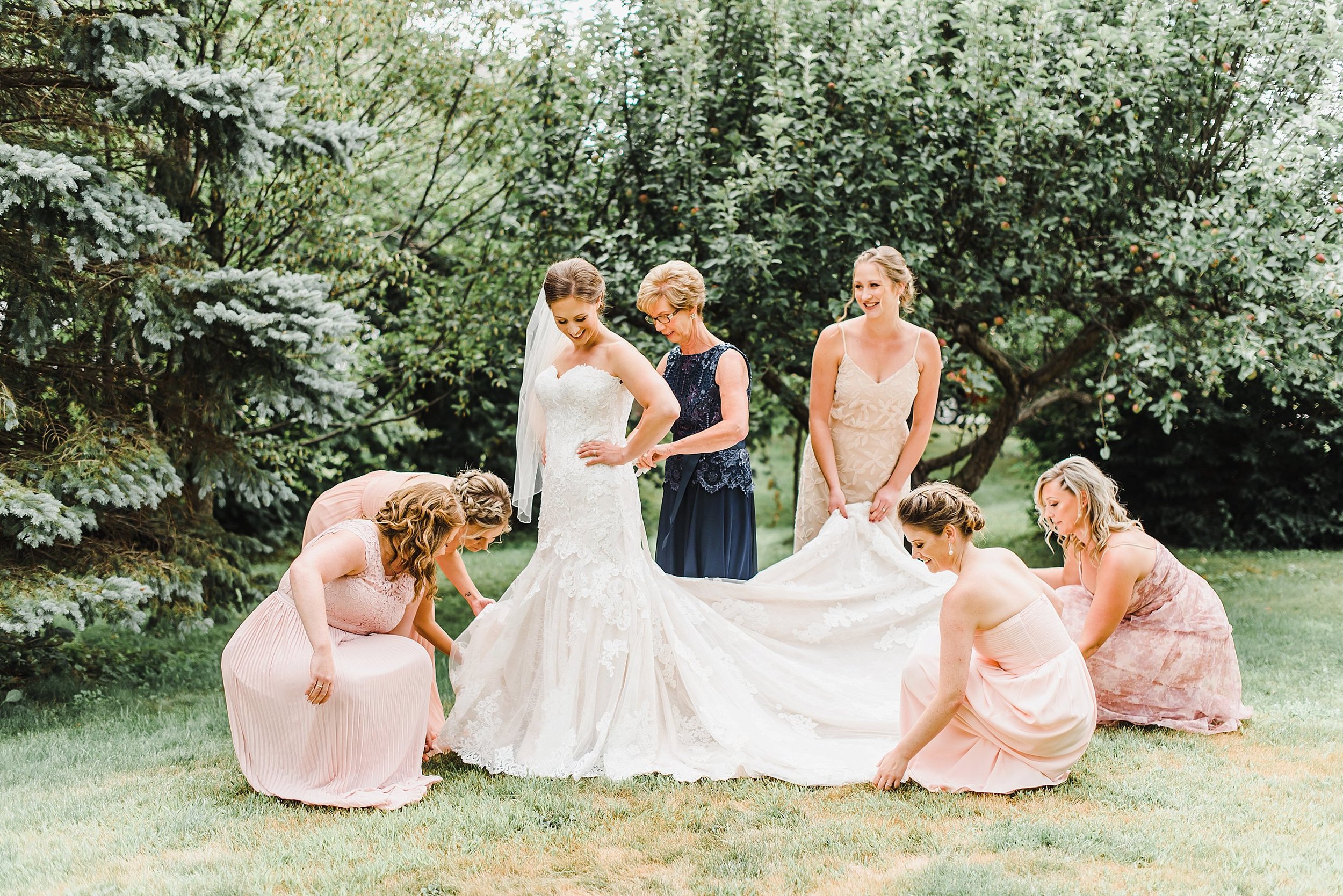  Audra got ready at her parent’s home in the country, so we took advantage of their beautiful backyard to capture her ‘getting ready’ moments with her mom and best friends! 