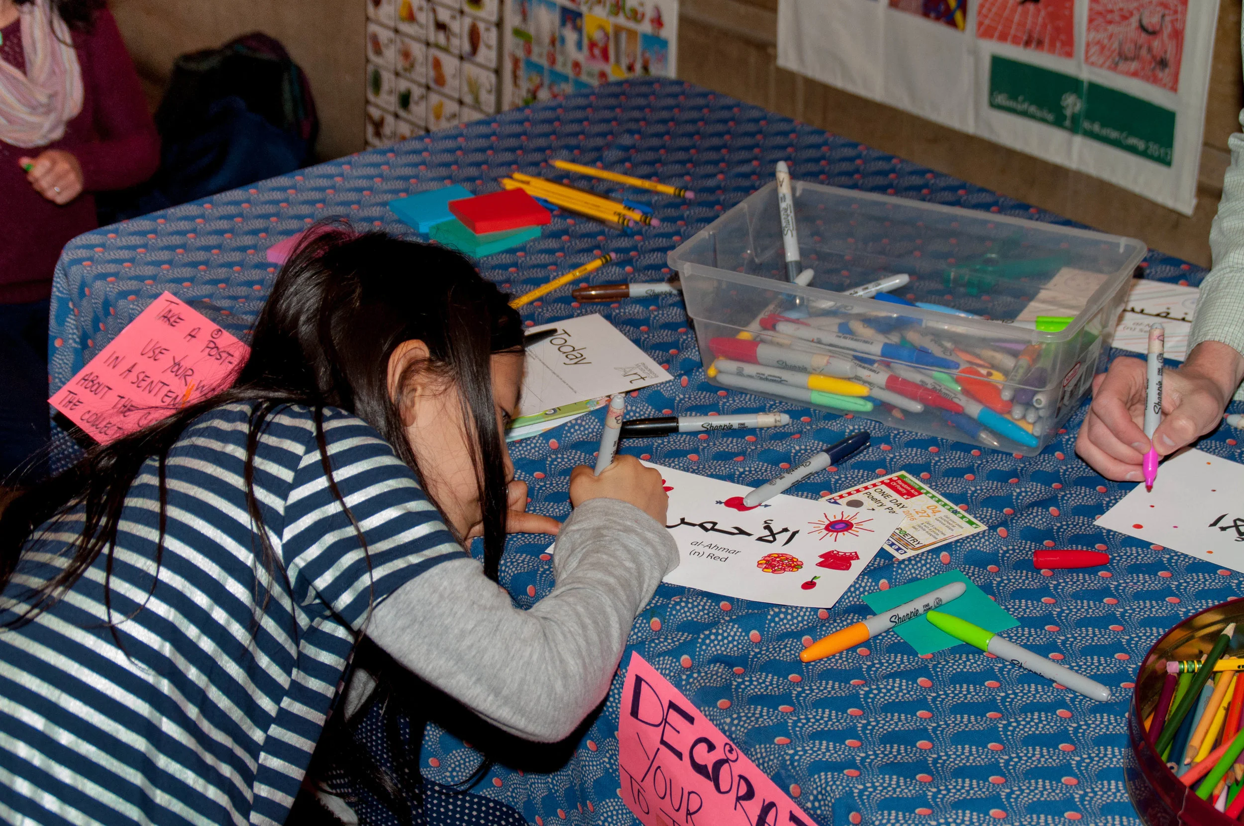 Nasij: Weaving Our Cultures into a Collective Poem. Poetry Station by Al-Bustan Seeds of Culture. Photo by Tieshka Smith. 