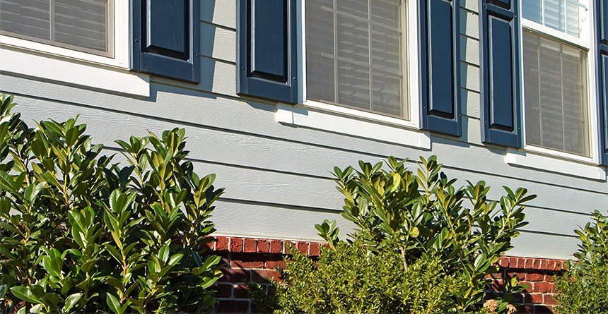 hardieplank-lap-siding-with-blue-shutters.jpg