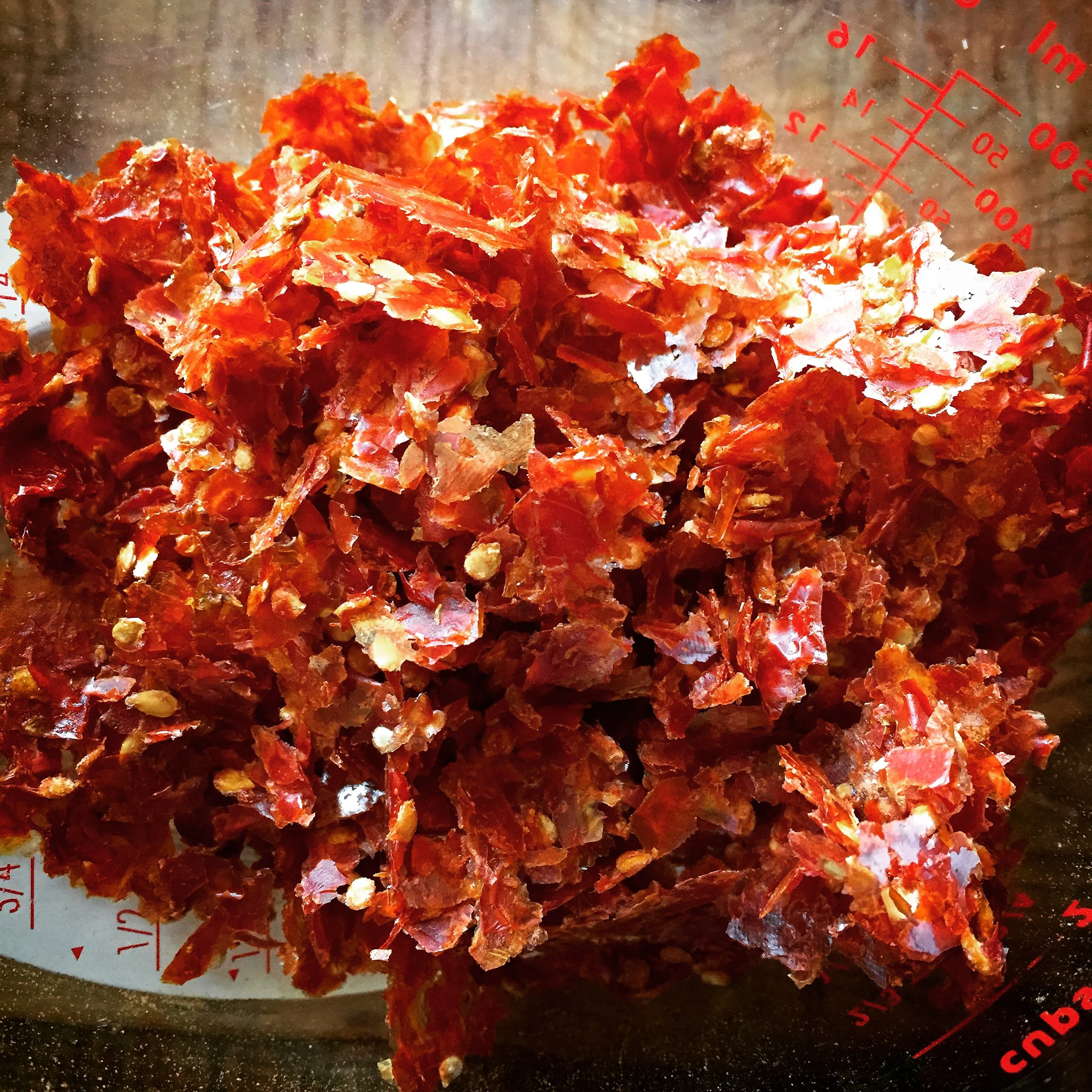 Dehydrated chunks of tomatoes, before processing into powder.