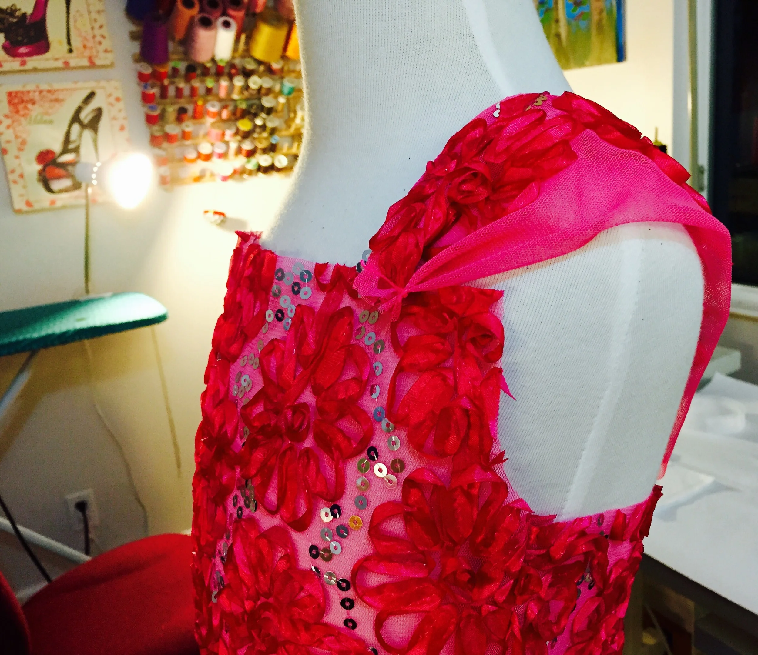 Draping the shoulder straps.Â