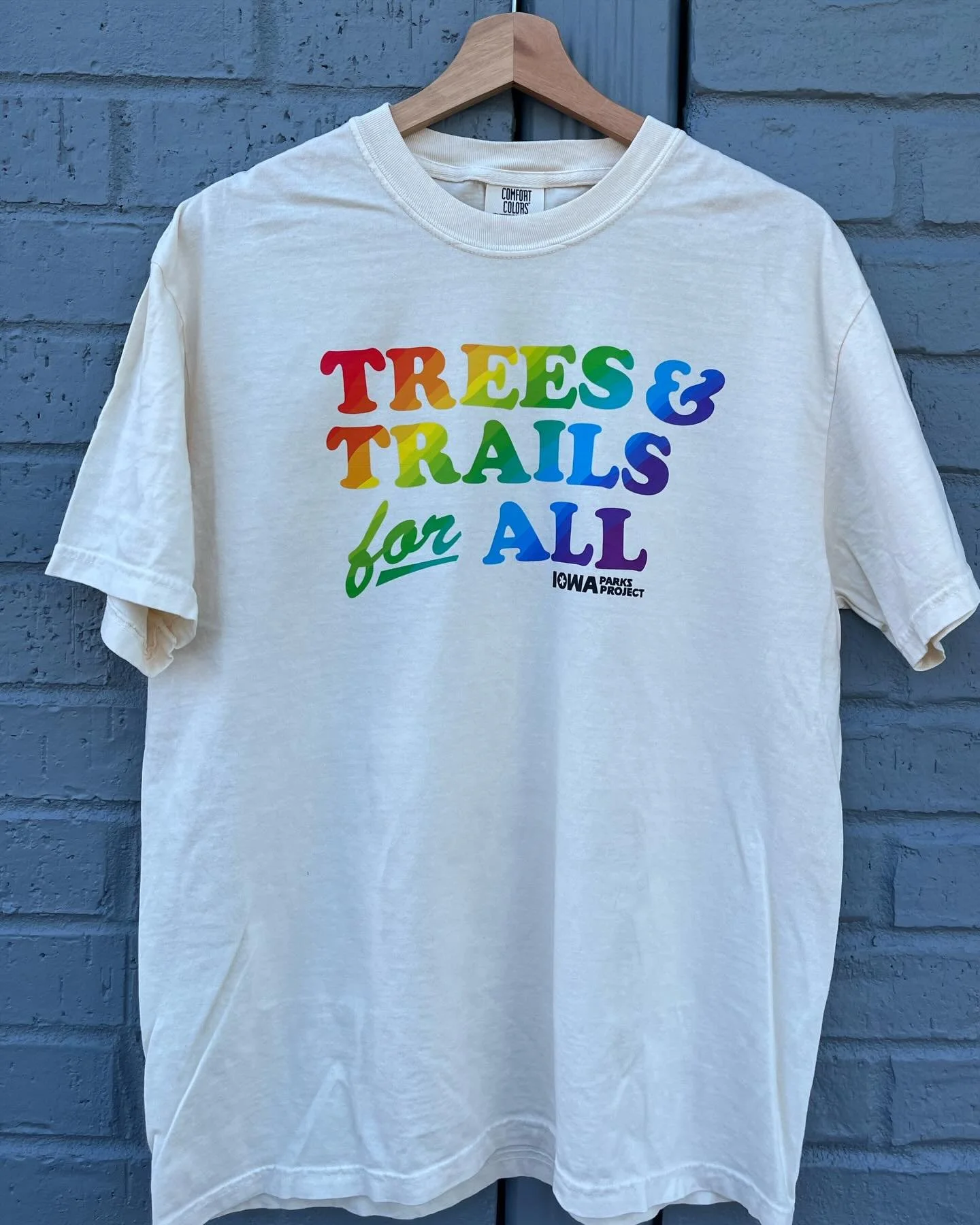 PRE-ORDER IS LIVE. We are closing out Pride Month with a limited edition @iowaparksproject &ldquo;Trees &amp; Trails for All&rdquo; tee. Printed with the highest quality DTF transfers on the crowd favorite @comfort_colors . Secure yours now through S