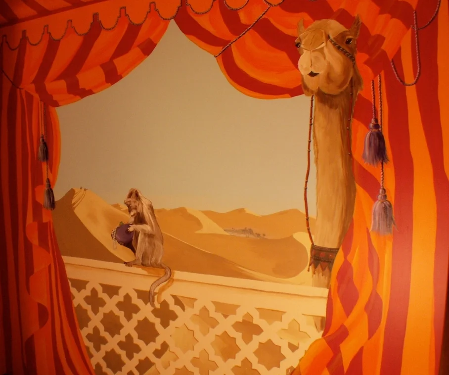  Exotic and enchanting images&nbsp;inspire creativity&nbsp;in this hidden play space located under a stairwell. Desert&nbsp;scenes and exotic animals&nbsp;open up this tiny space to become a vast&nbsp;oasis for&nbsp;play and imagination within a cara