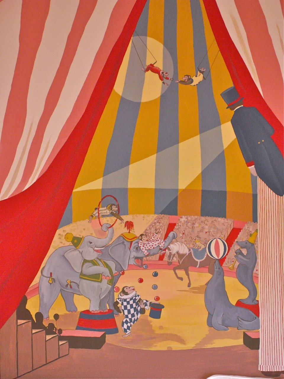  The curtains part and the center ring at the circus is revealed. 