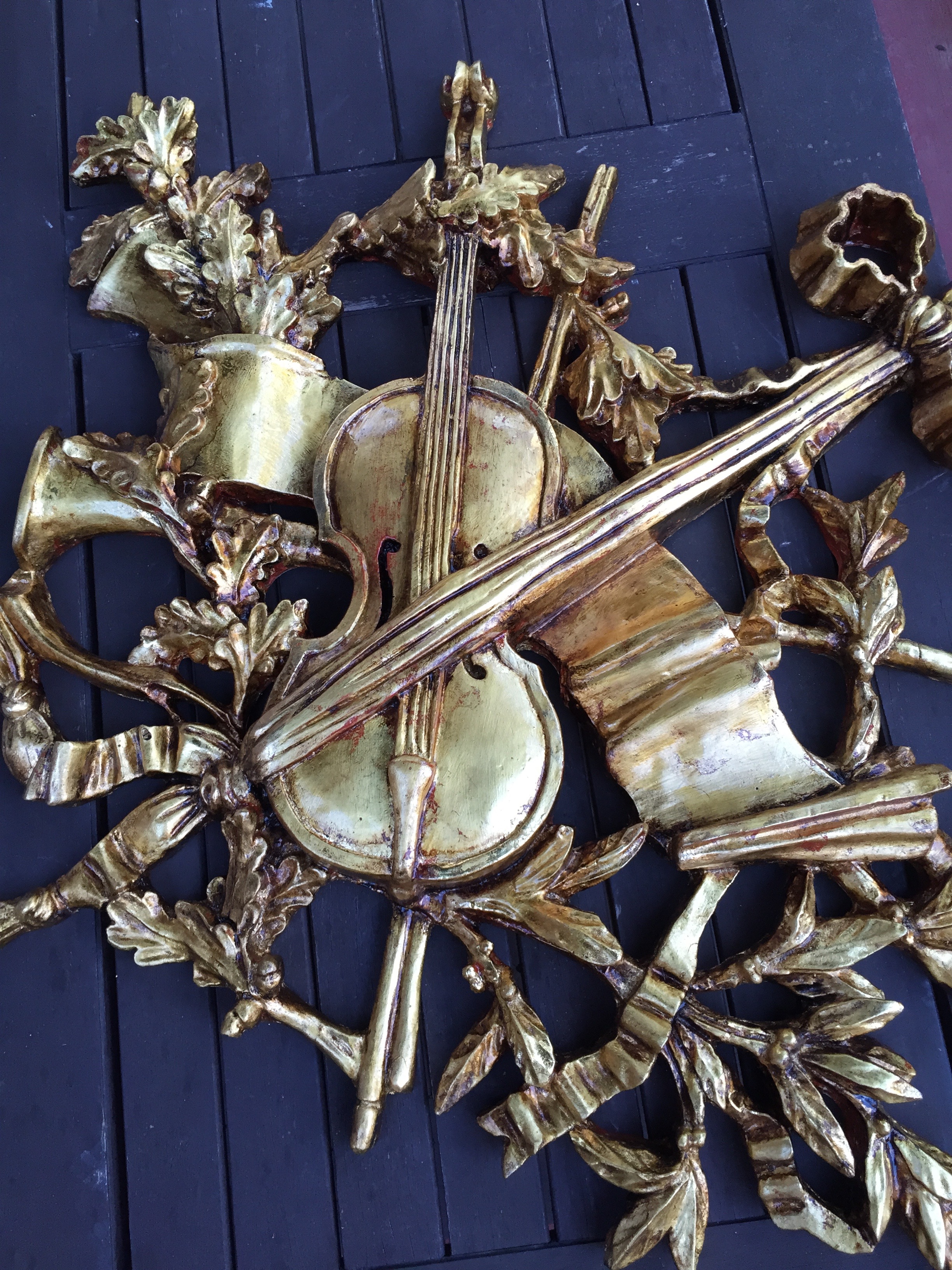 A plaster cast sculpture that I gold leafed and antiqued.