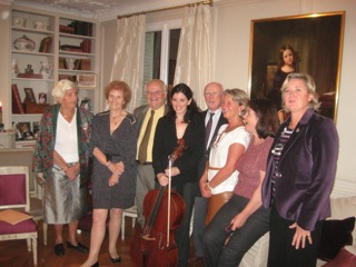 Louise with 7 direct descendants of Franchomme, Paris 2011: Elisabeth, Claire, Thierry, me, Denys, Marie-Christine, Florence, and Beatrice. A lovely 19th century painting of Auguste's son René in the background. René was a prodigy cellist and budding composer who died at age 19.