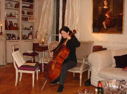 Louise playing Auguste Franchomme's Forster cello at a party in Paris, 2011. Among the guests were the seven Franchomme descendants pictured above!