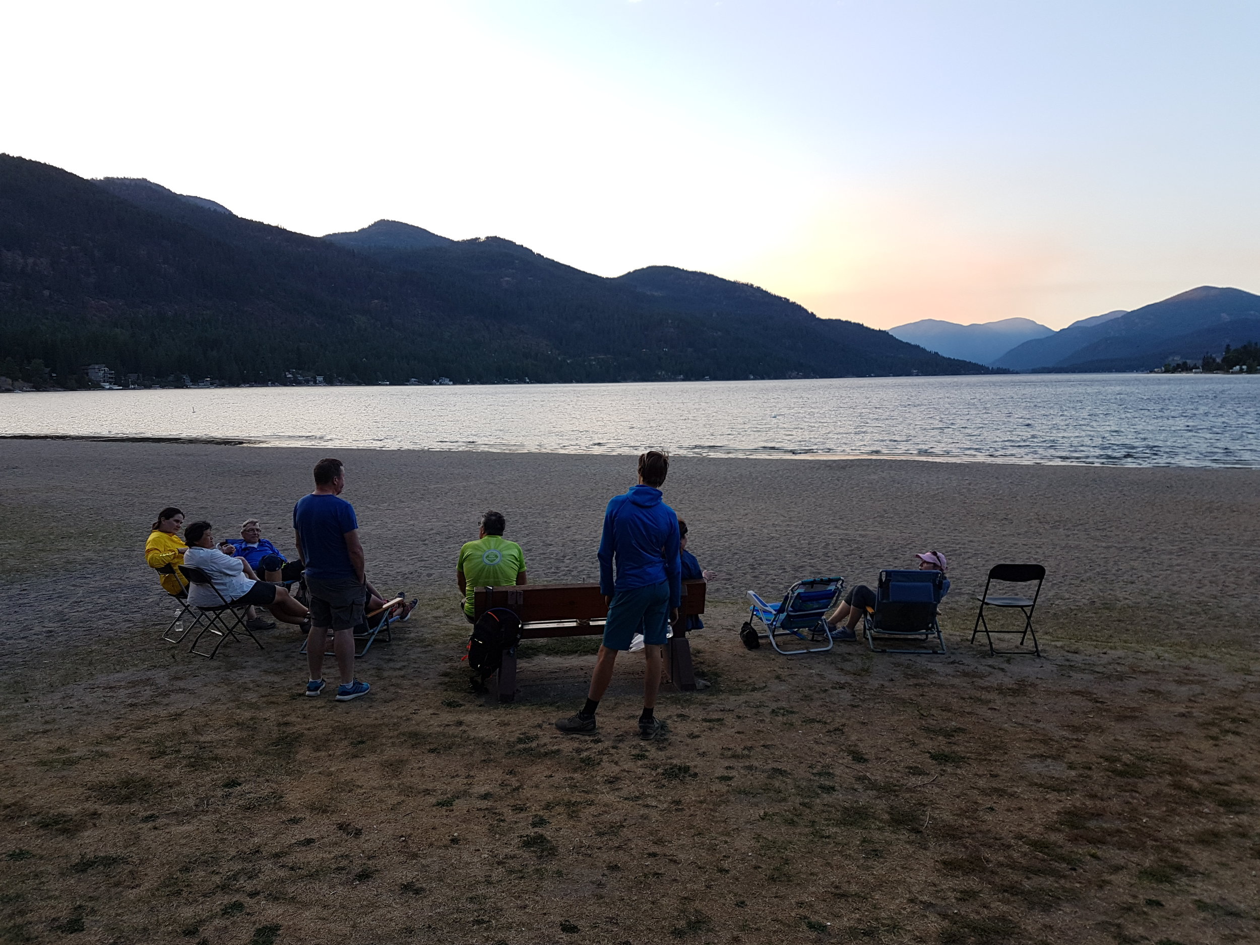 Enjoying the sunset at Christina lake during our multiday bike tours