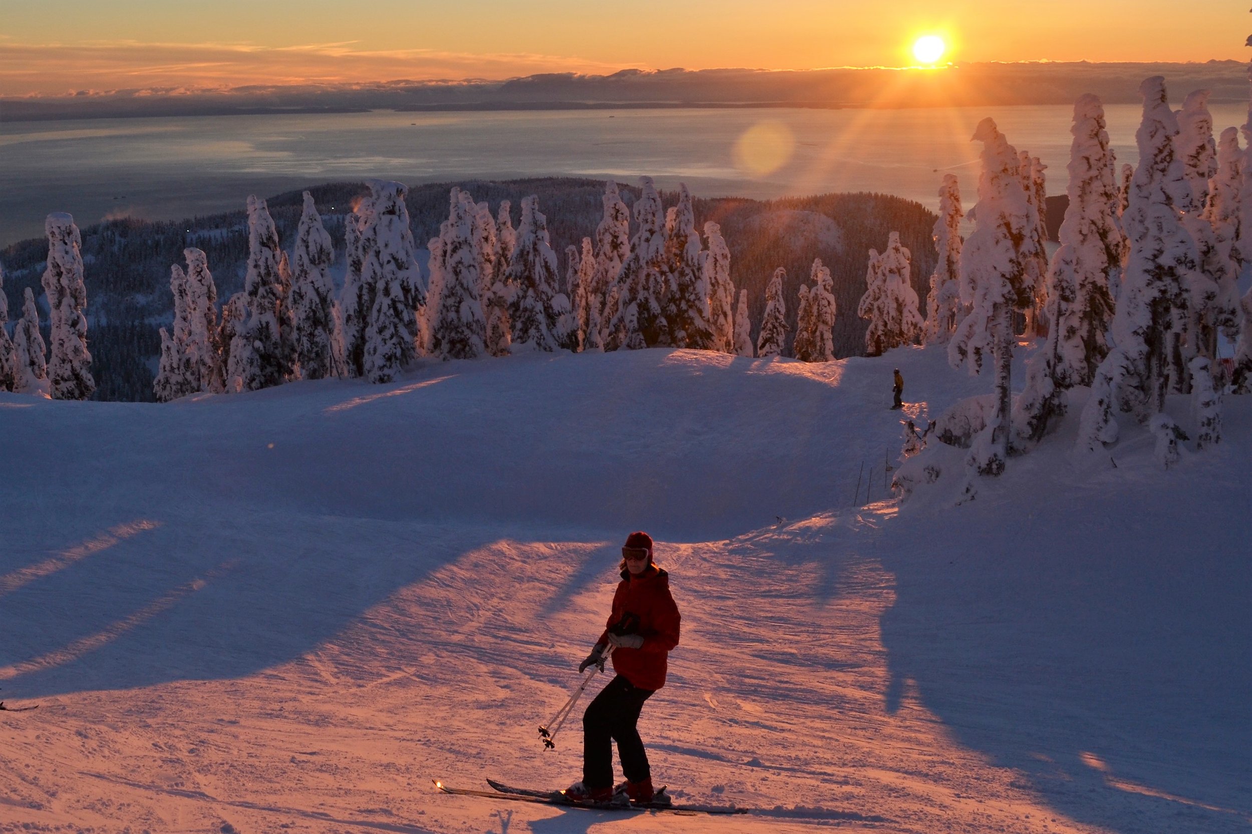 Skiing at one of the local mountains in Vancouver during sunset