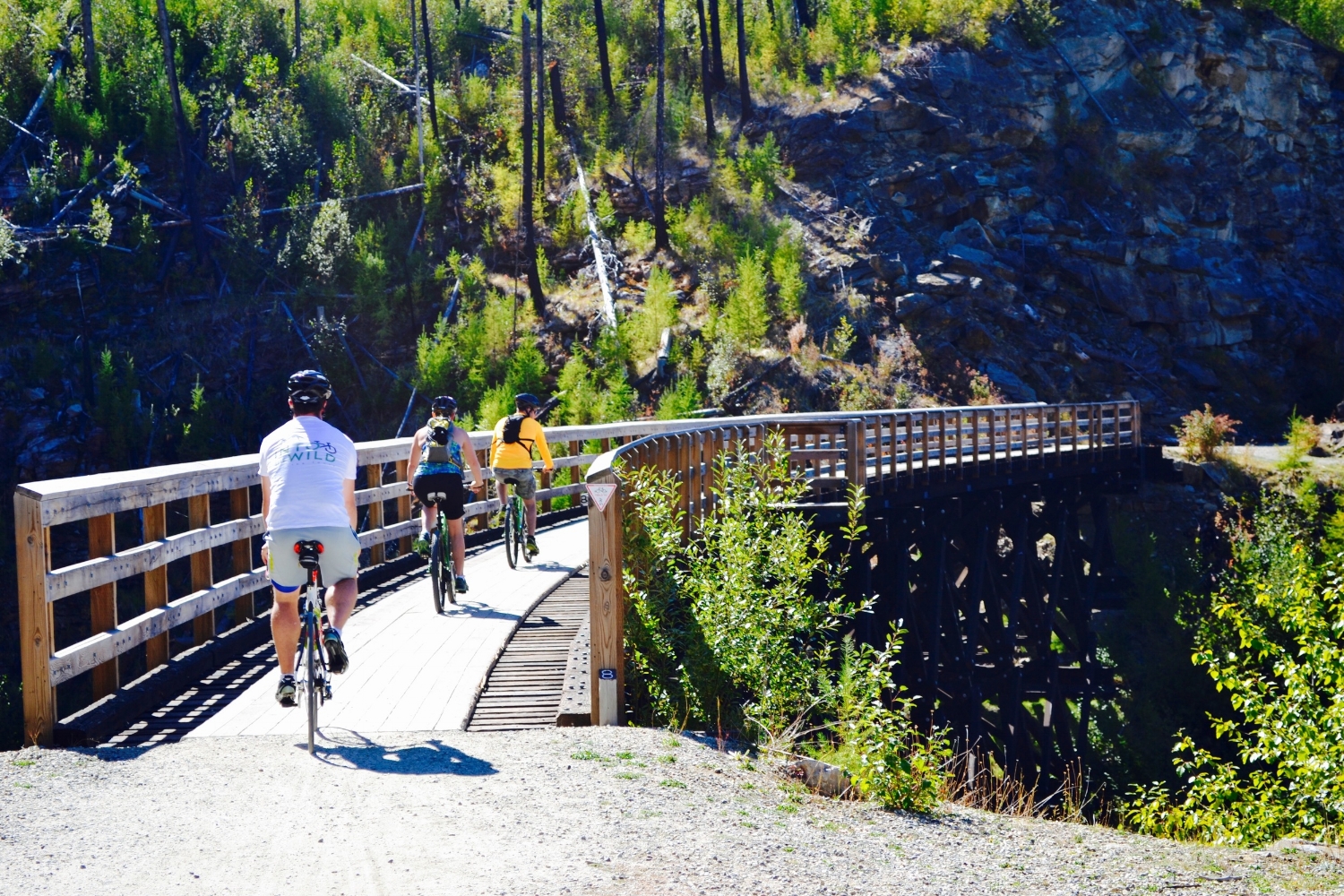 Cycling over a trestle on the KVR at Myra Canyon, British Columbia