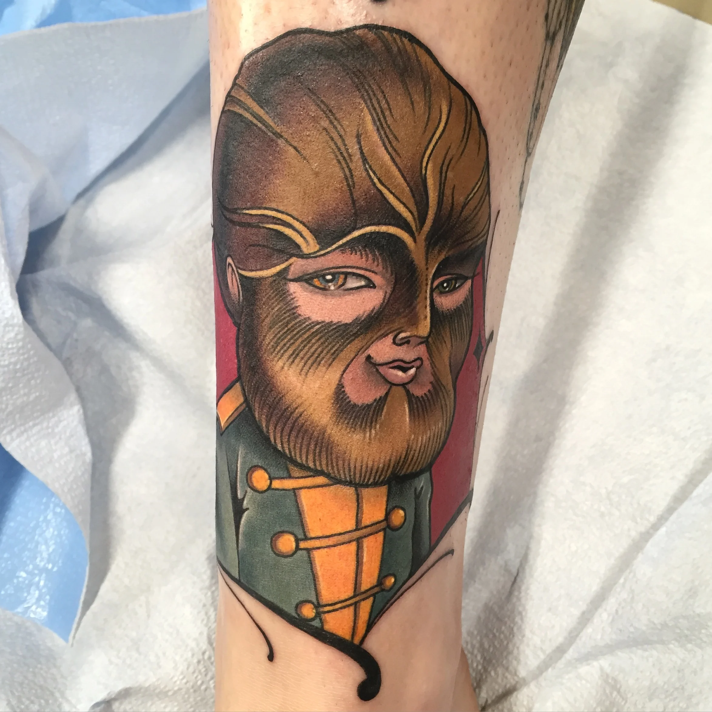 Dog faced boy illustrative tattoo