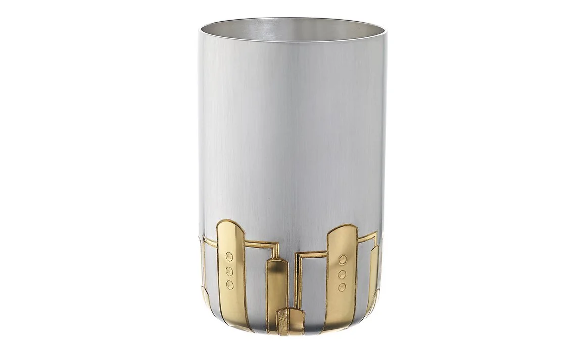 The finished gin tasting beaker adorned with a repeat pattern inspired by the stills used for the gin making process