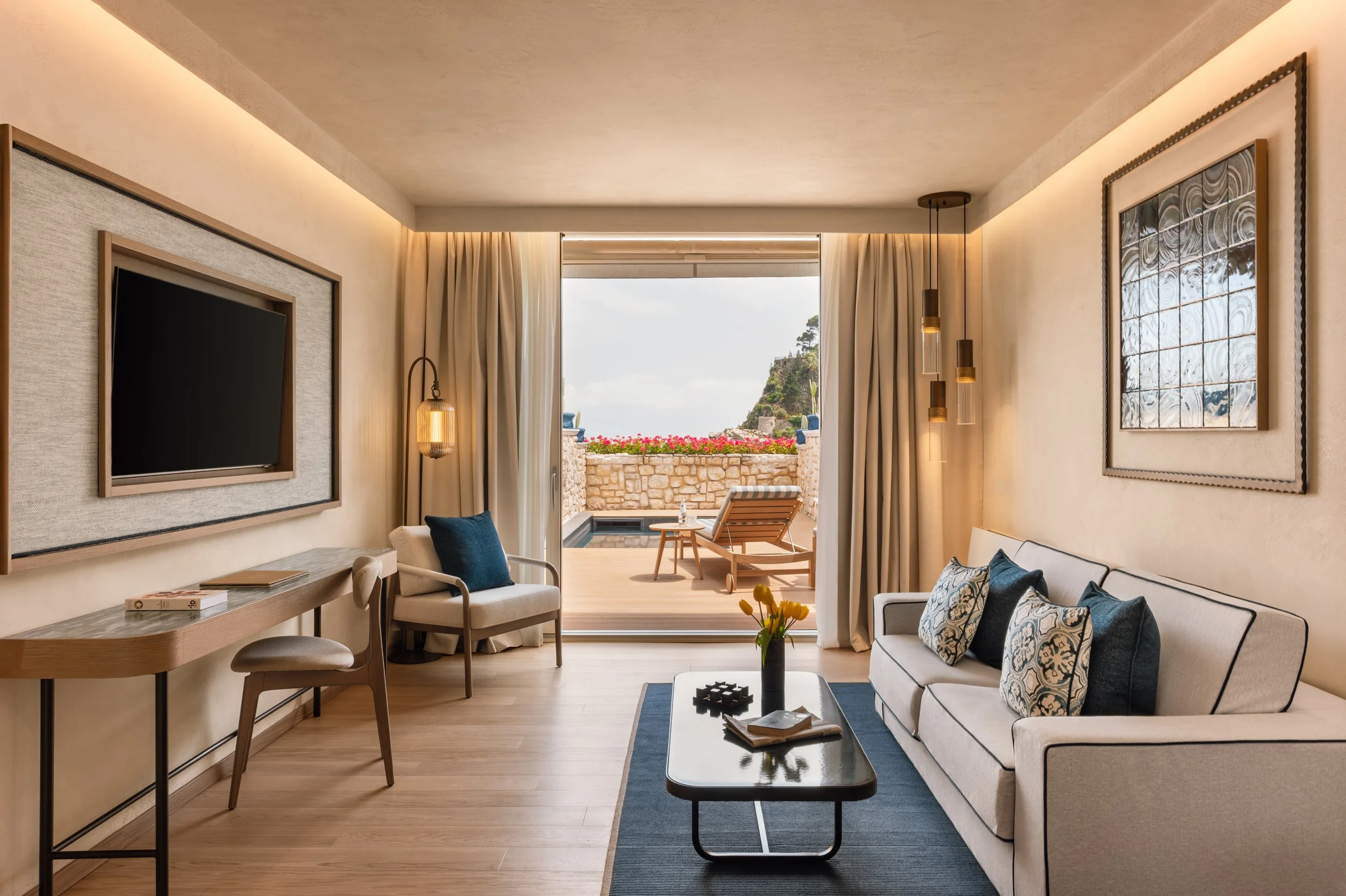 Luxury hotel suite living room with terrace and sea view, interior photography by David McConaghy