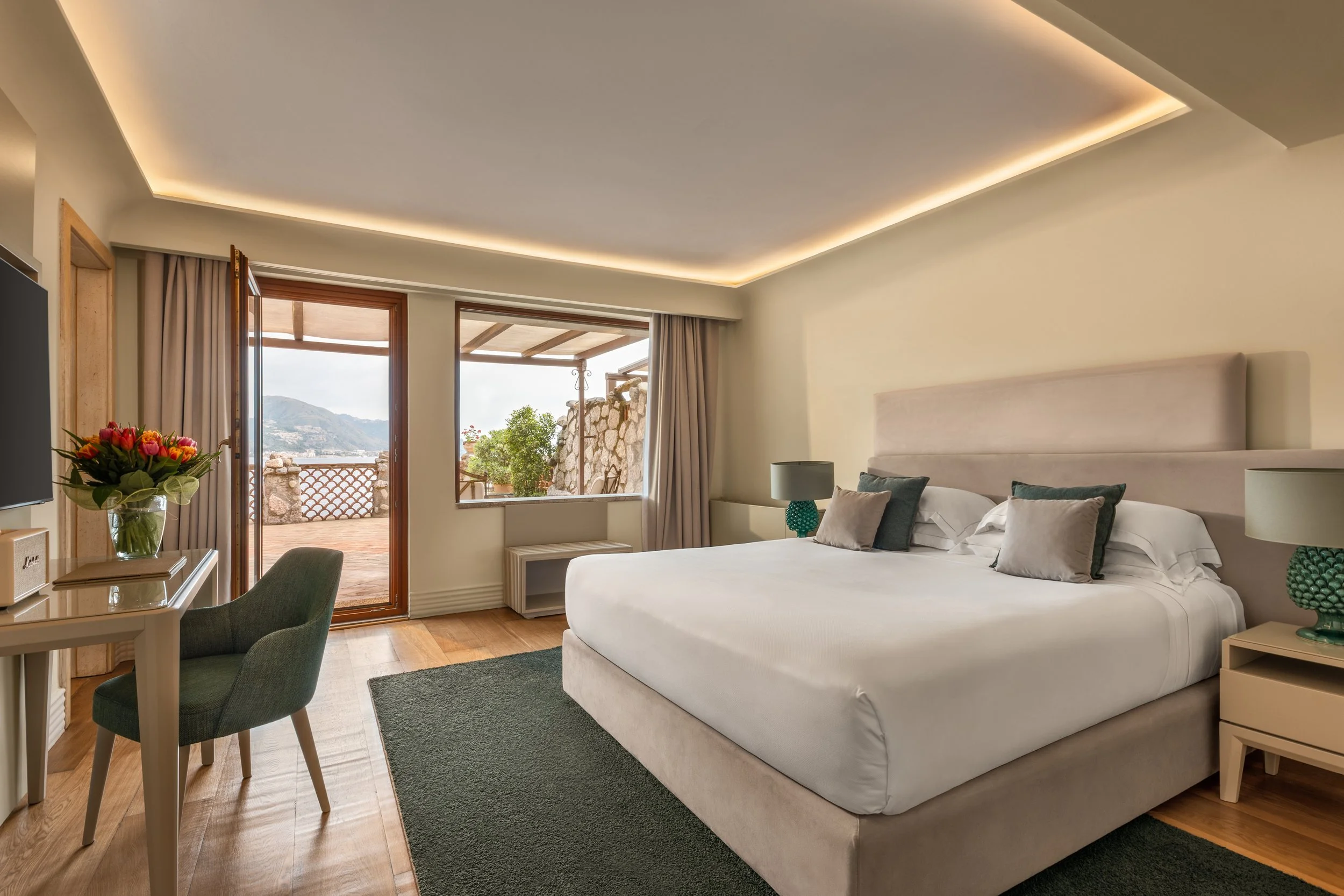 Luxury hotel bedroom with mountain and sea view, interior photography by David McConaghy
