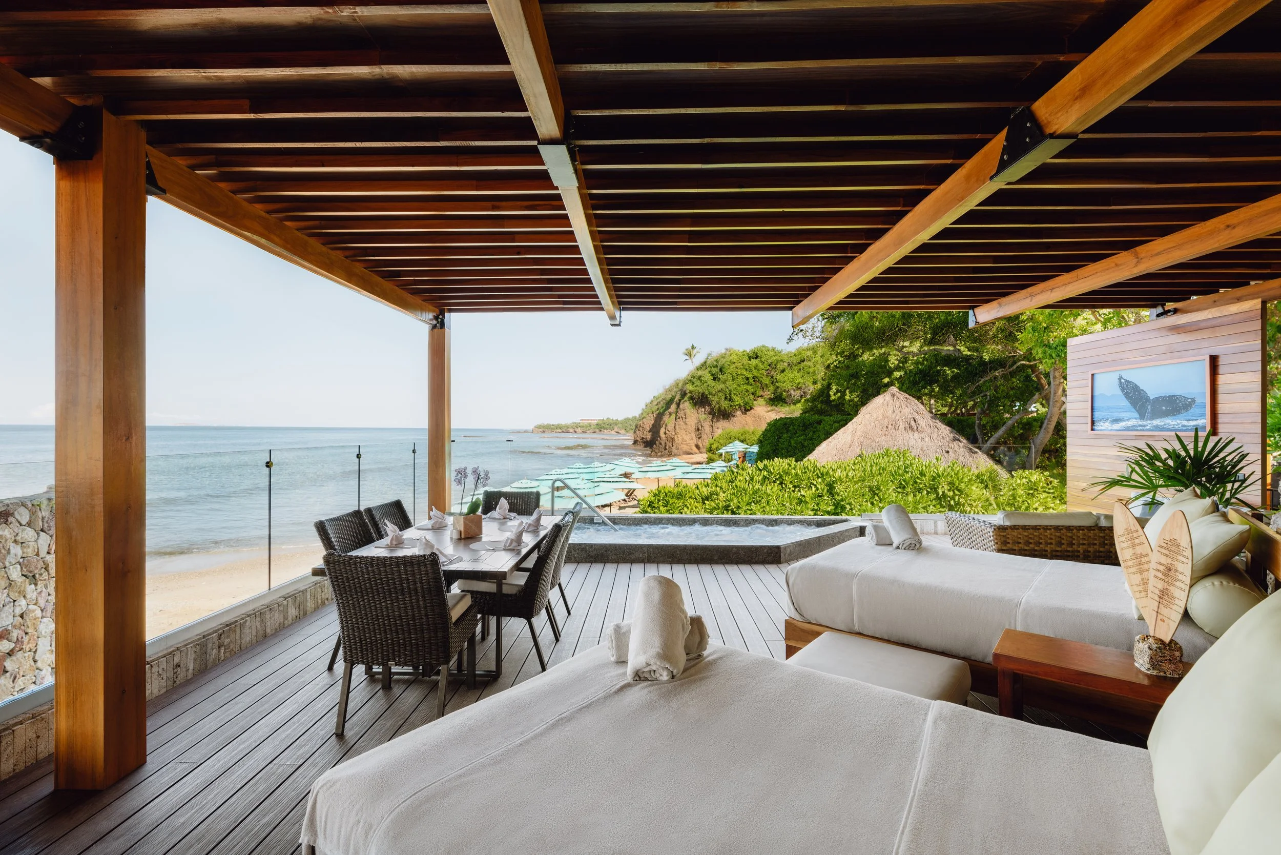 Outdoor dining terrace with ocean view at luxury boutique hotel, David McConaghy Photography