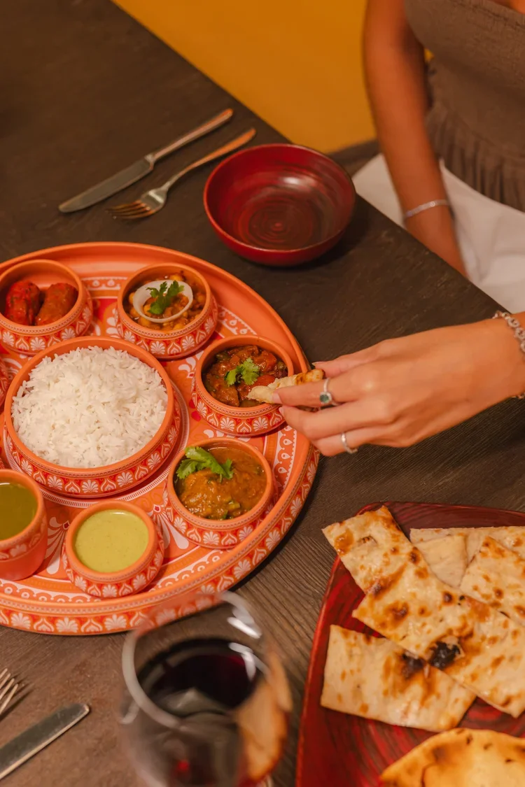 Indian thali sharing platter at luxury hotel restaurant, food and beverage photography by David McConaghy