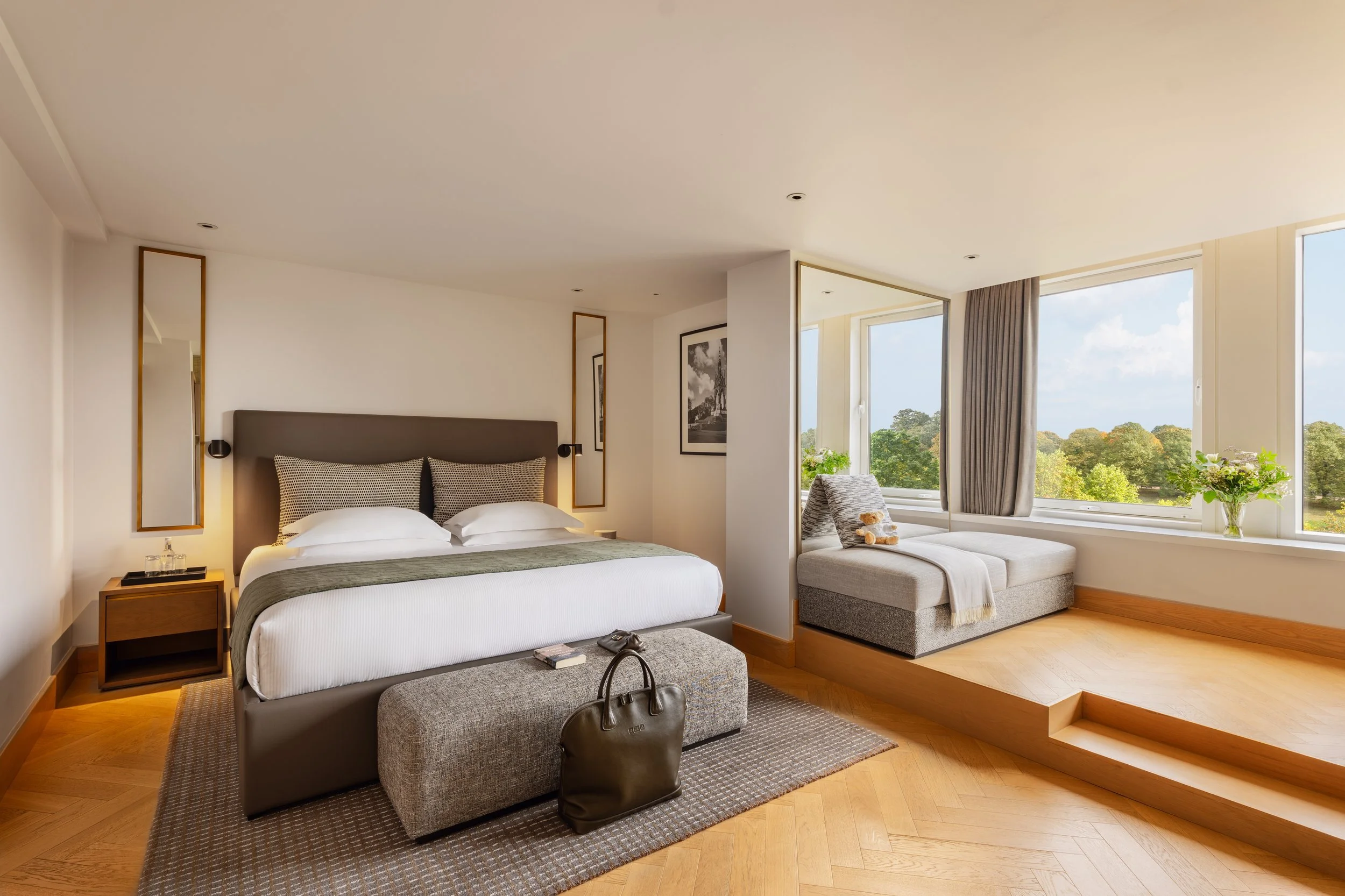 Bright hotel bedroom with natural light and garden view, interior photography by David McConaghy
