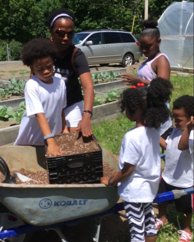 Making milk crate gardens at the farm today. Thanks Zach Pickens