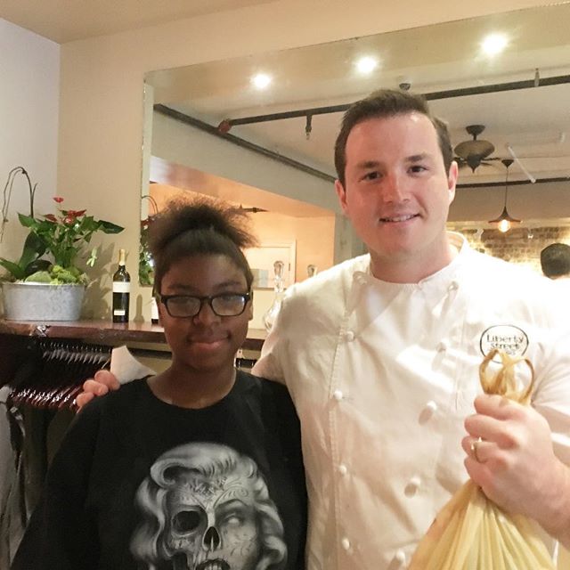 The Farm's first sale!! Roedasia Hargrove sold garlic scapes to Chef Mike at Liberty Street Bistro. Great work Roedasia!!
