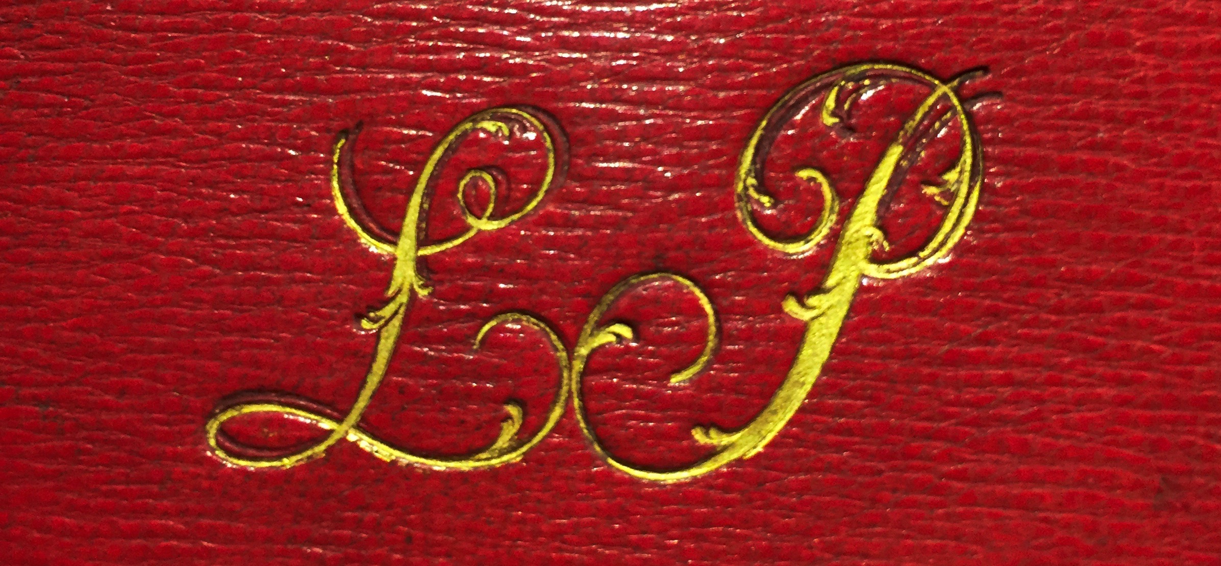 Detail of the cover of vol. I. Gilt "LP"