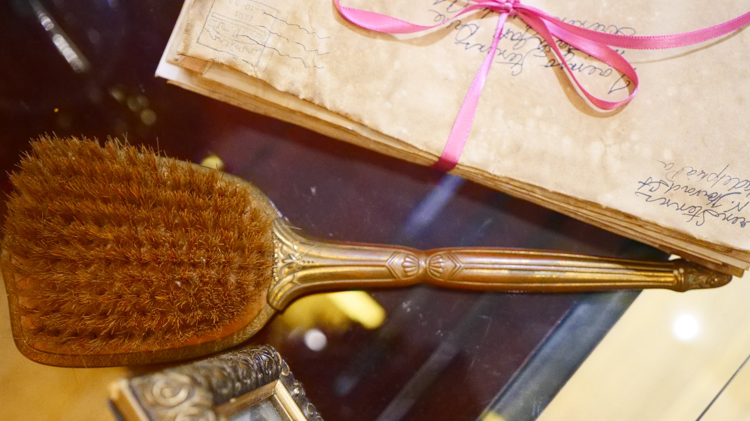  Brass hair brush from the collection of Monna Morton. 