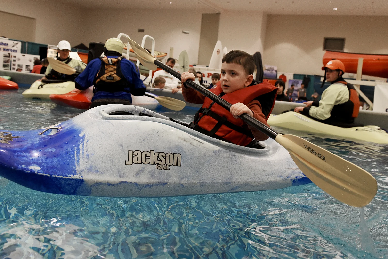ERICA MILLER / GAZETTE PHOTOGRAPHER Jackson Cowell, 5-years-old of Mechanicville, learns to kayak in a indoor pool set-up during the Adirondack Sports Summer Expo at the Saratoga Springs City Center on Saturday afternoon, March 18, 2017.