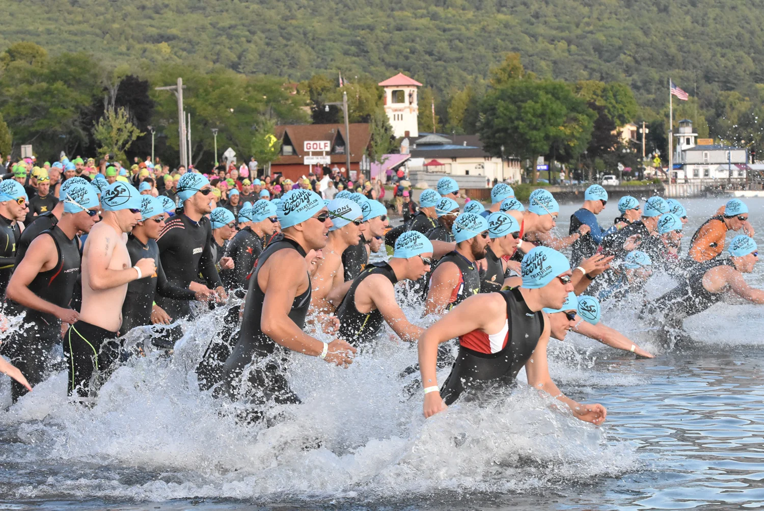 An Olympic swim wave starts at the 2016 Lake George Triathlon Festival. Pat Hendrick Photography