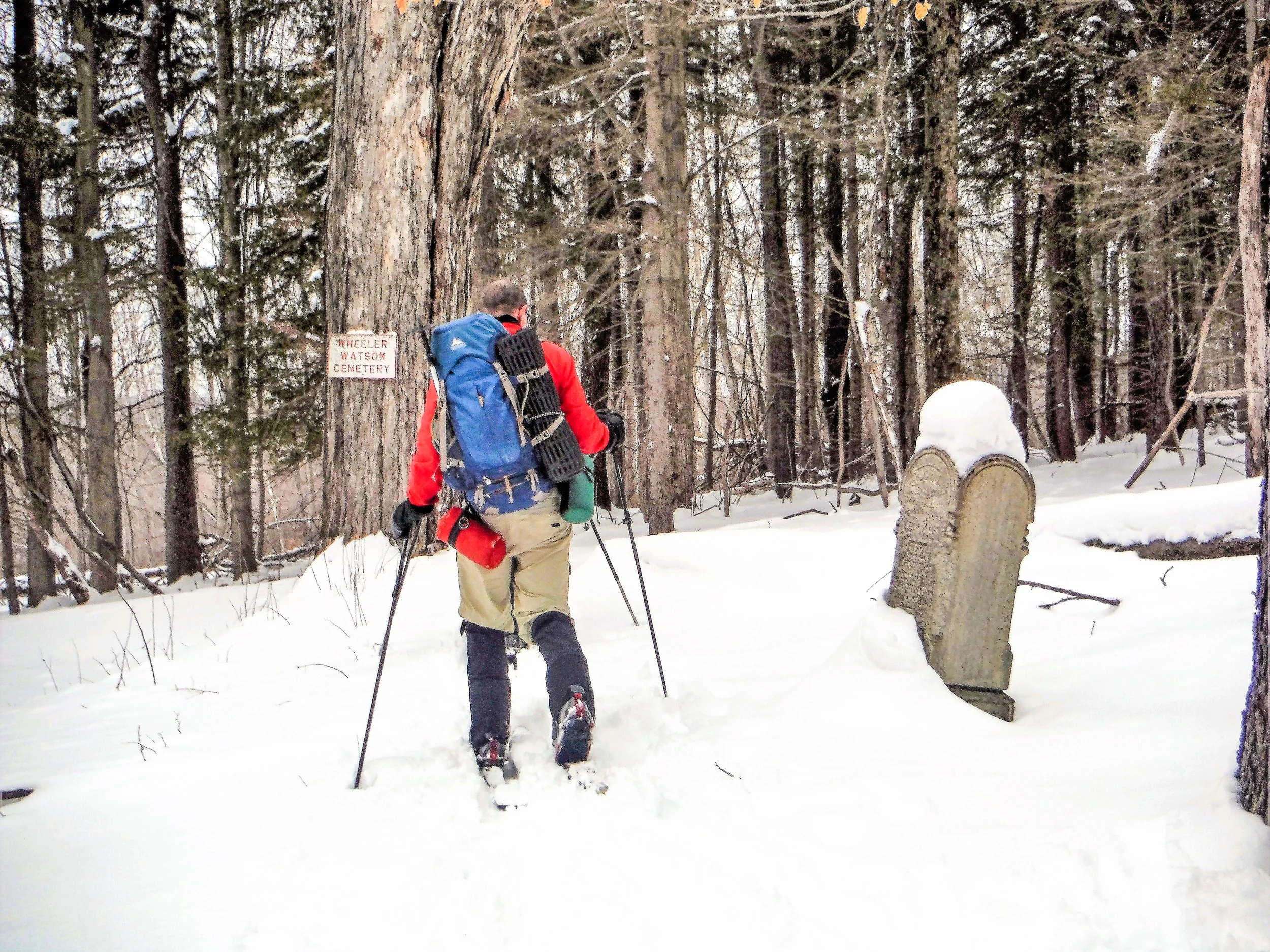 Passing by the old cemetery on the Wheeler-Watson Trail at the Huyck Preserve. Rich Macha
