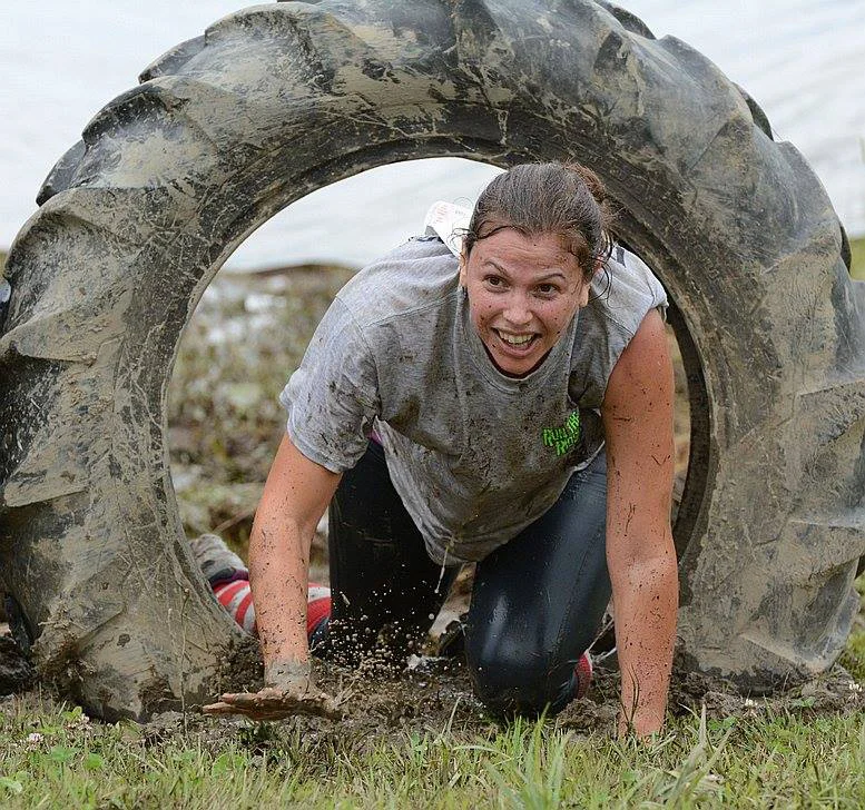 Getting dirty at the 2017 Run the Ridge 5K Mud Run. Maple Ski Ridge
