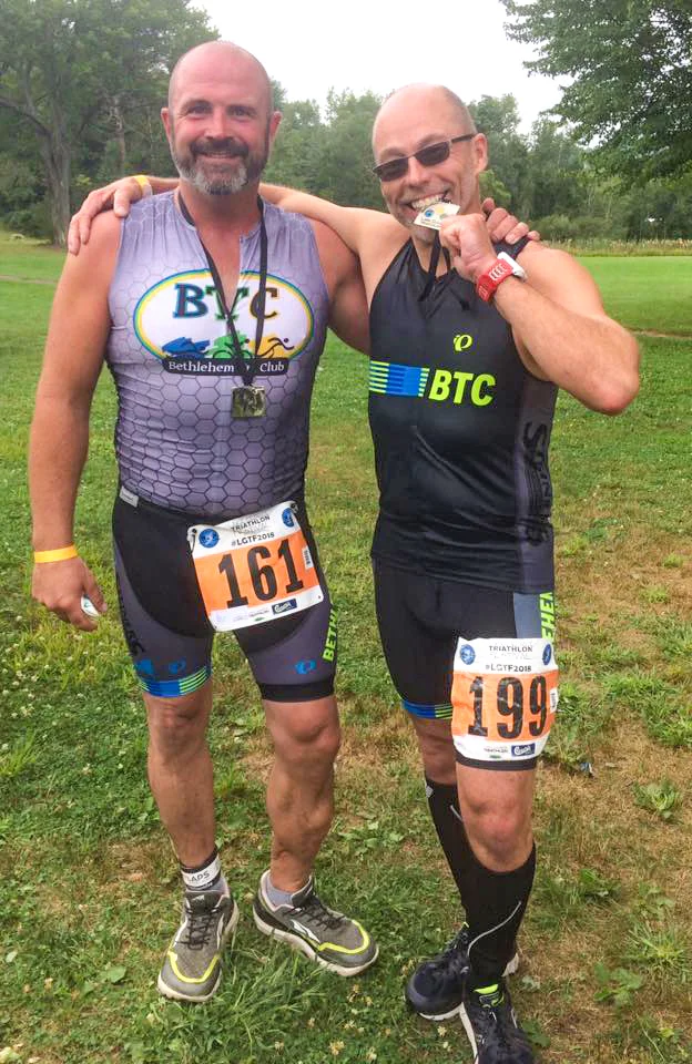 Larry Salvagni with Dr. Tom after his first Olympic at 2018 Lake George Tri.