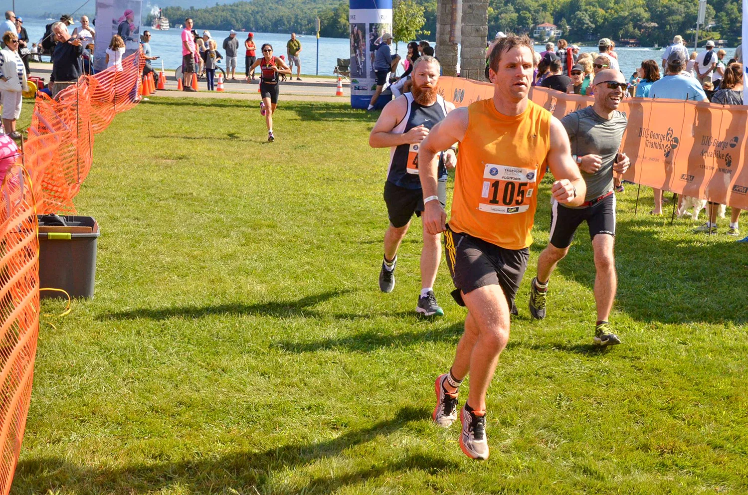 Finish line sprint at the 2016 Lake George Triathlon Festival. Adirondack Race Management