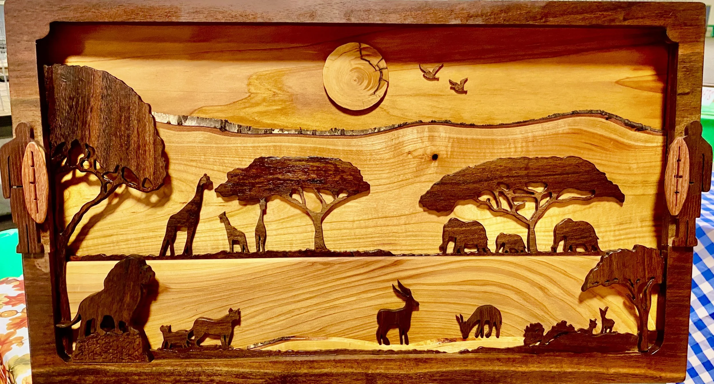 Safari Scene = $1,800 Hand Crafted - Black walnut and red cedar. Seven layers.