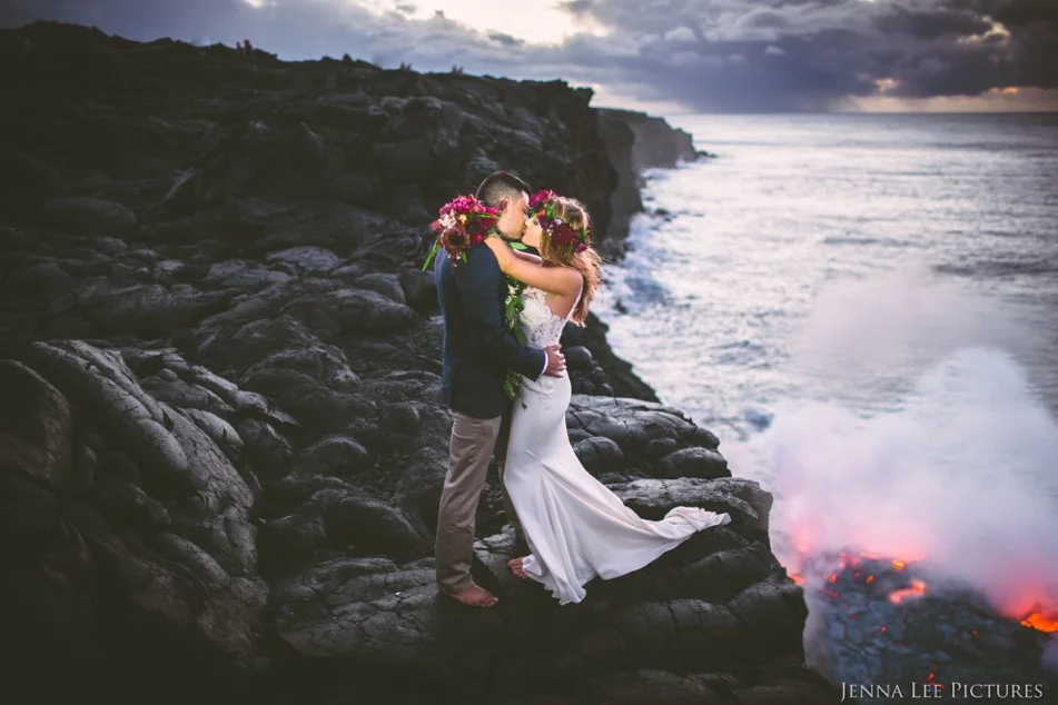 Alex and Lauren Michaels kiss as lava from Kilauea flows into the Pacific Ocean on August 11. This was the first time the lava reached the ocean since 2013.