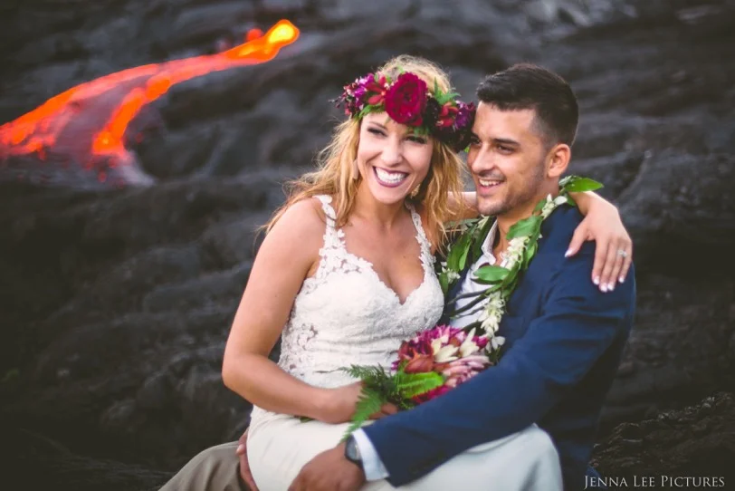Alex Michaels holds his wife Lauren while sitting on Kilauea on August 11. The couple was married in June.