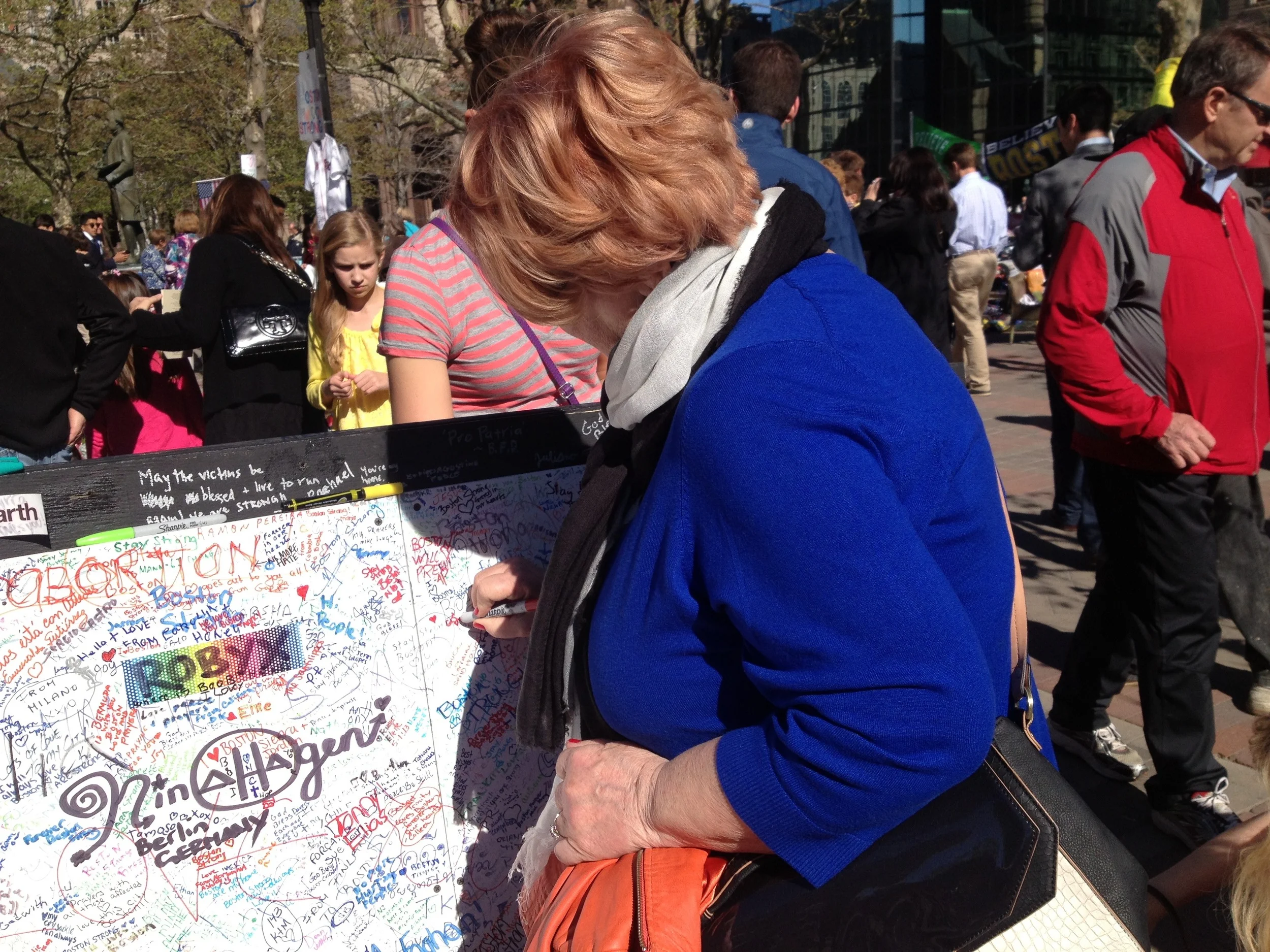 Mom at the make-shift memorial just weeks after the marathon 2013
