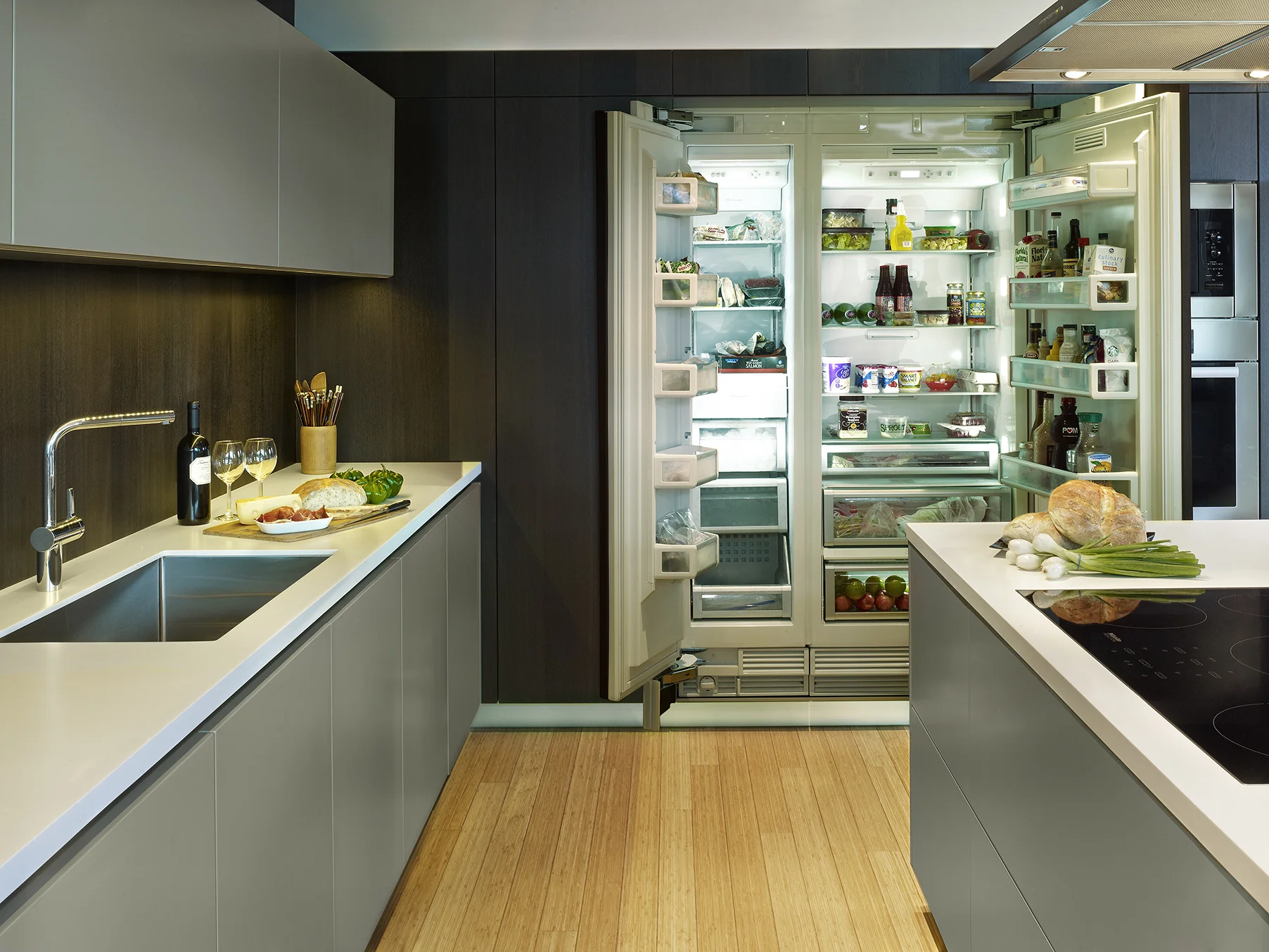 project details: sage matt lacquer hand brushed spessart oak snow white krion tops veselbrand " stick " tall pulls Blum servo hardware miele appliances