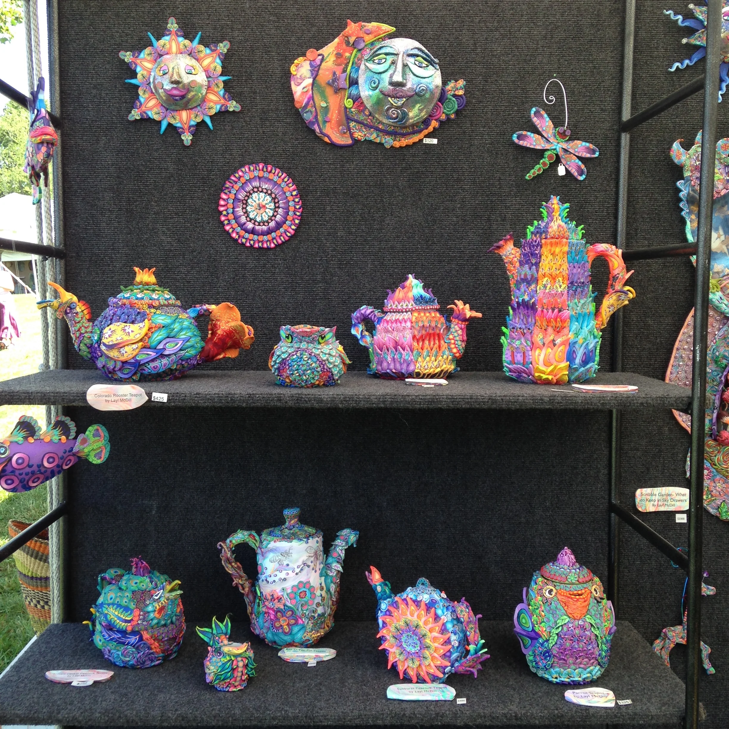 Shelves of teapot sculptures at the beginning of the summer. 
