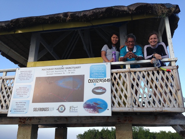 Heather, Marisa, and village official in damaged MPA guardhouse. Photo: ZSL