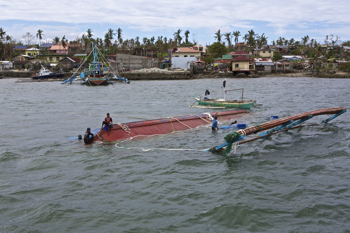 Typhoon Yolanda affected many fishermen in the Visayas. On the way from Hagnaya to Bantayan there where a lot of damaged and some sunken boats. Photo by Steve de Neef