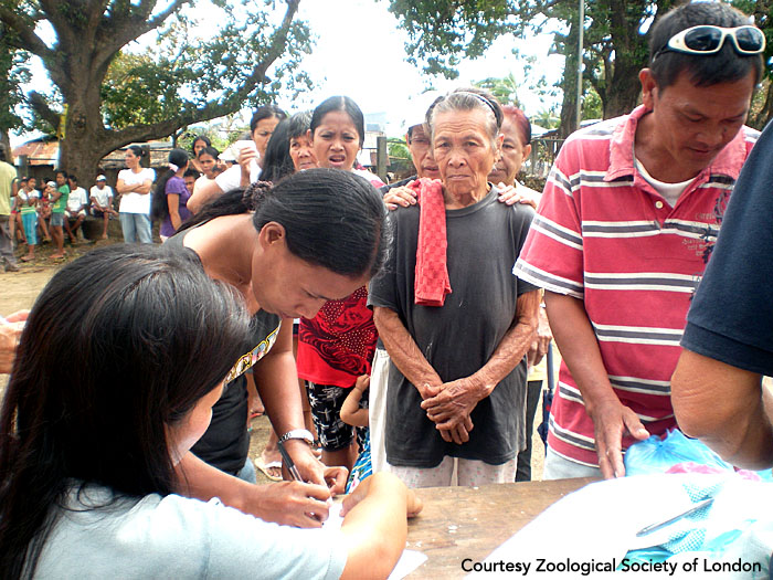 Registration for post-storm disaster relief assistance. Panay, Philippines. Photo courtesy of ZSL