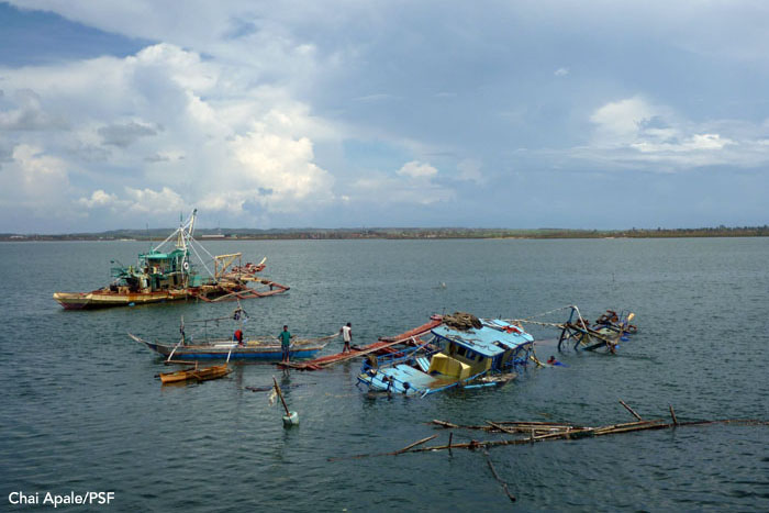 Fishing boats destroyed during the storm near Bantayan, Philippines. Photo: Chai Apale/PSF